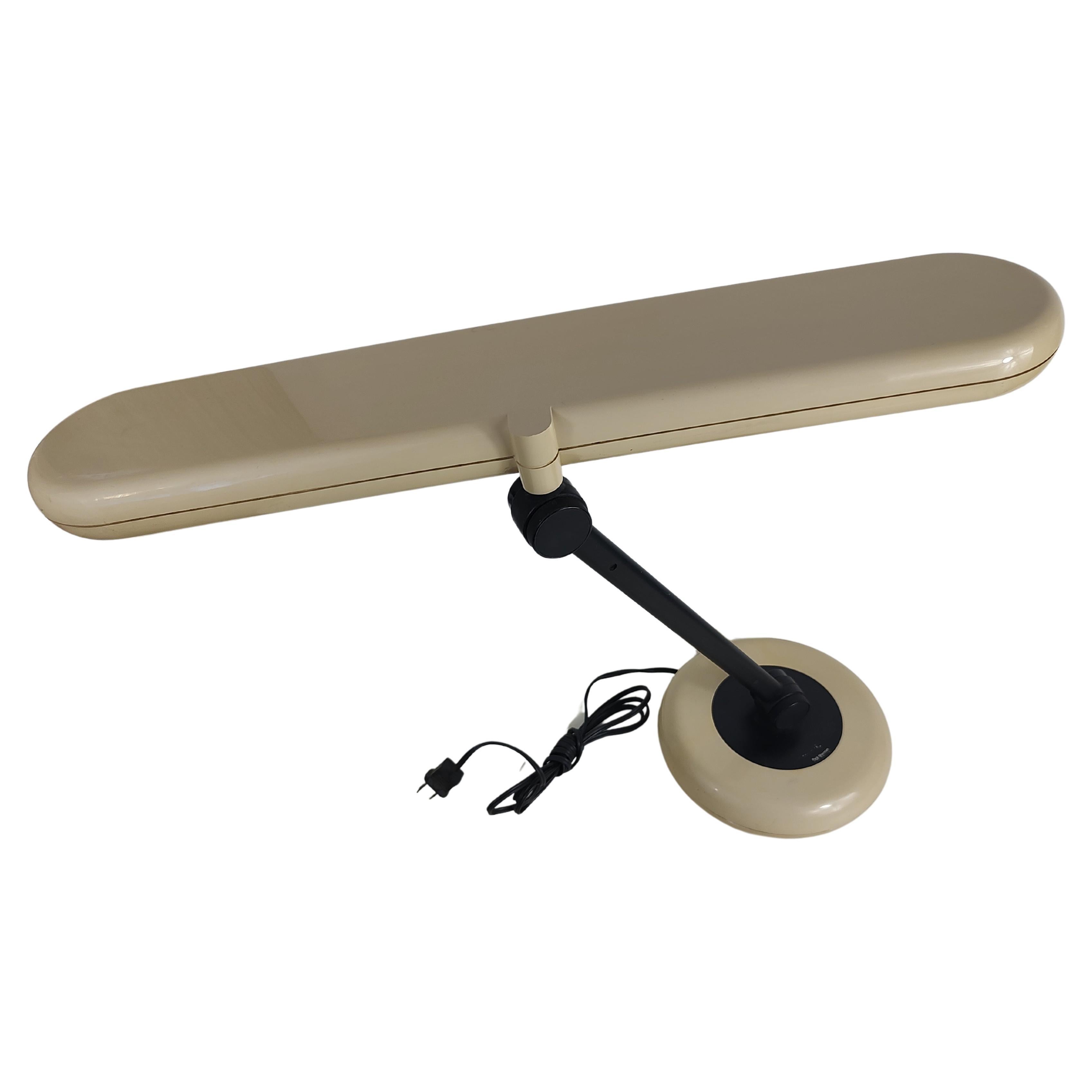 Fabulous and in excellent vintage condition with minimal wear. Two long florescent bulbs illuminate the work space. Heavyweight plastic in this high quality desk lamp by Park Sherman. UL listed with little to no wear on this two tone beauty.