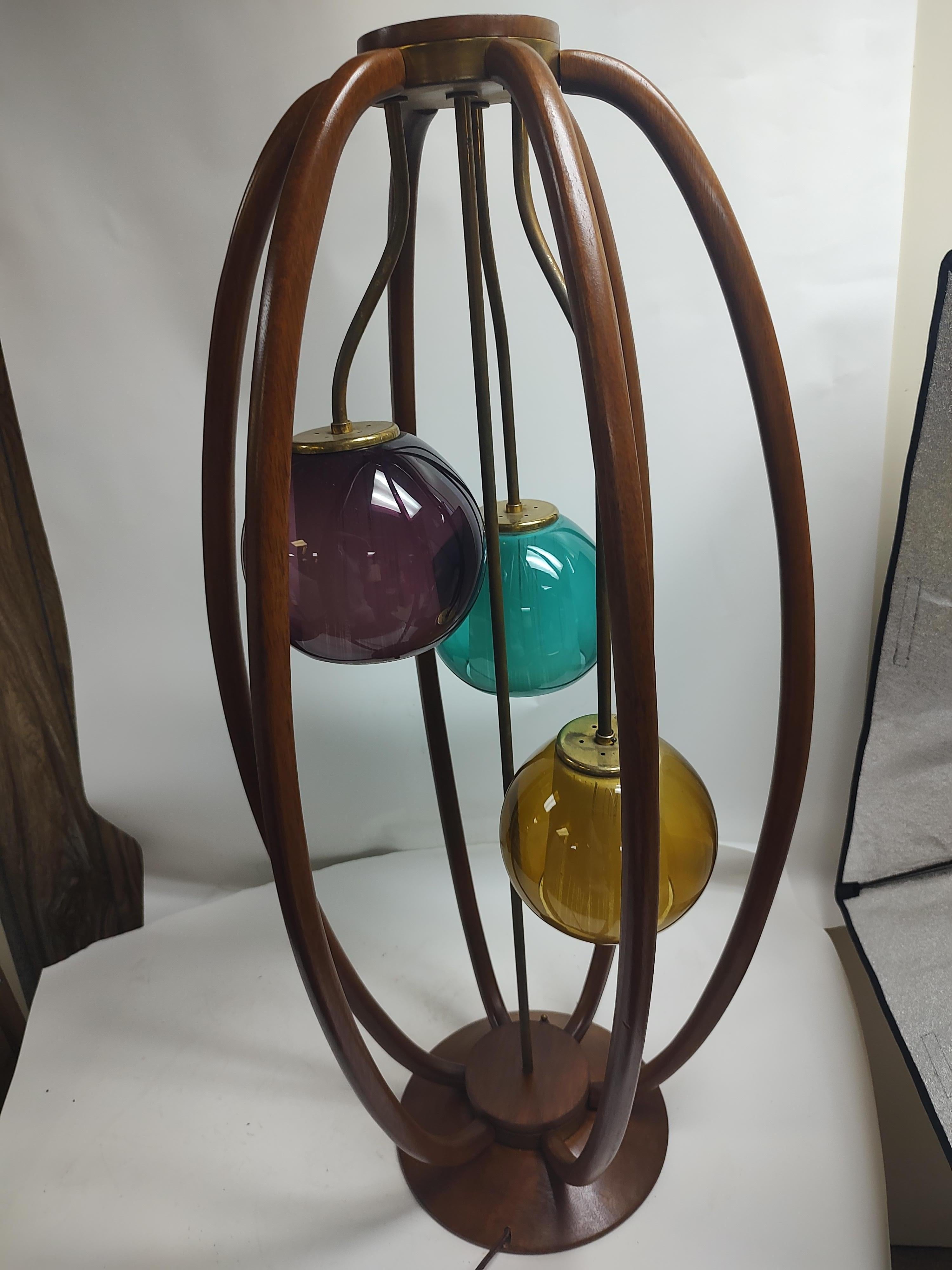 Fabulous 3 light with a 3way switch, one two or all 3 lights depending on the mood. Amethyst, yellow and green colored outer shades with white glass with a strie inside the colored glass shades. In excellent vintage condition glass is perfect. Tall