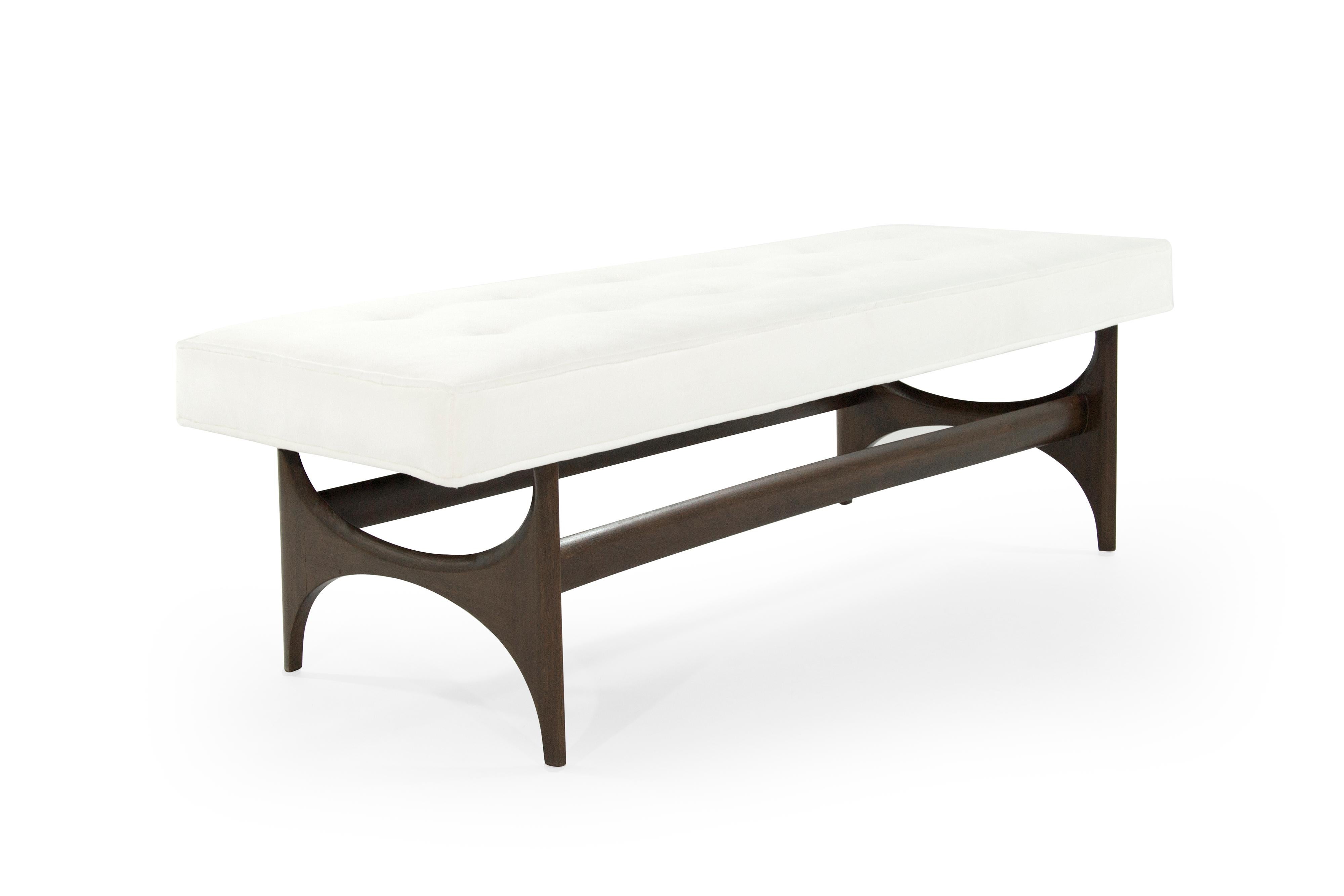 Bench featuring a fully restored sculptural walnut base. Newly upholstered in white wool.