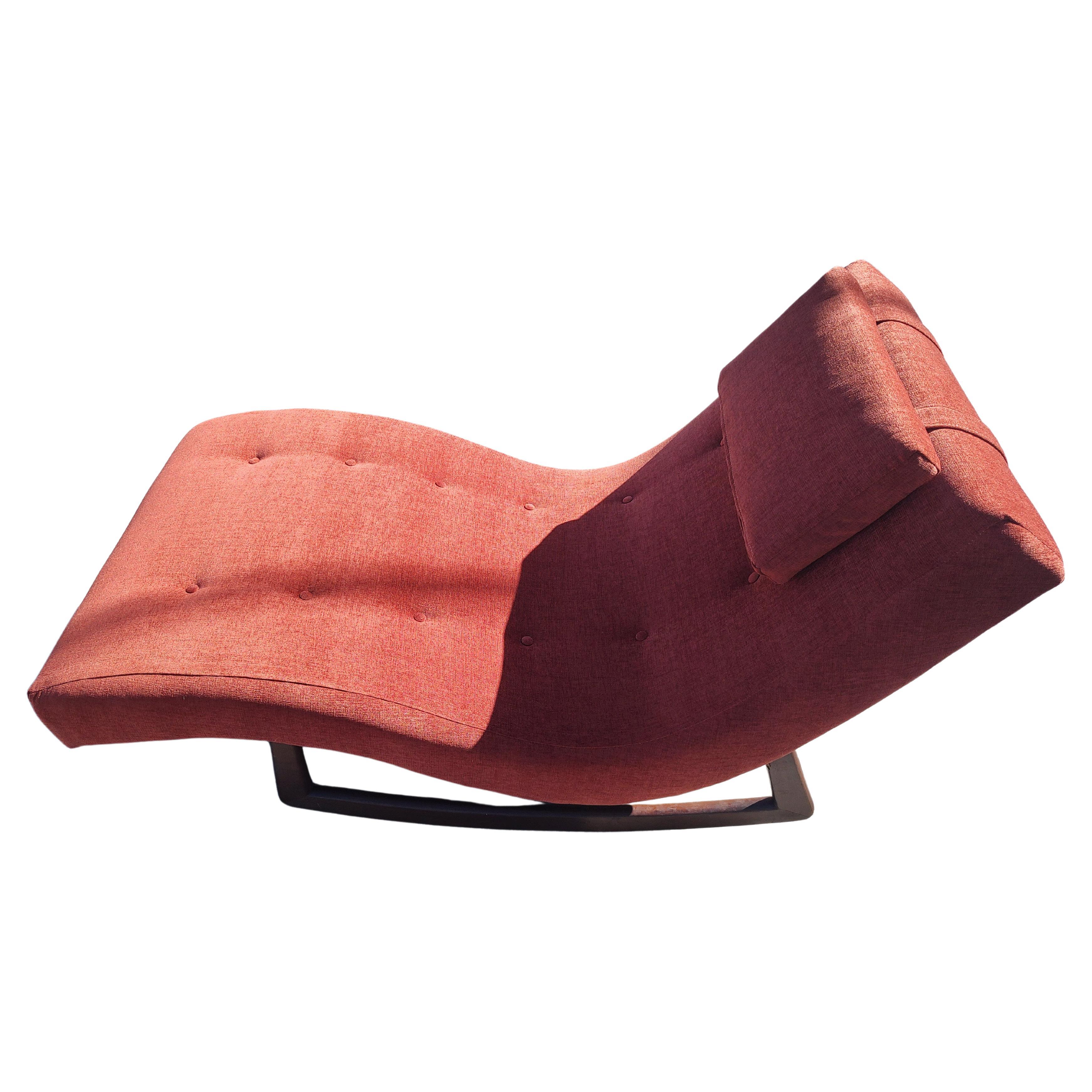 Fabulous Adrian Pearsall Wave Rocker Chaise Lounge Chair created in about 1960 with a walnut in case and totally reupholstered in a soft textured Boucle like material. Built in headrest pillow for added comfort. Such an amazing design built to