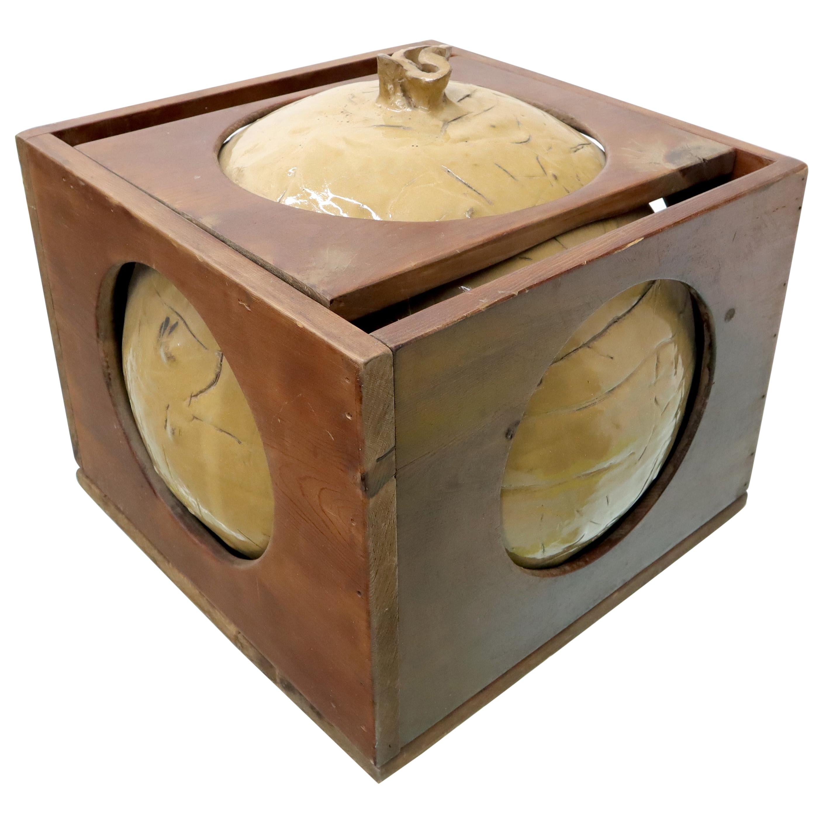 Mid-Century Modern Sculpture of a Ceramic Sphere Ball Incased into Wooden Crate