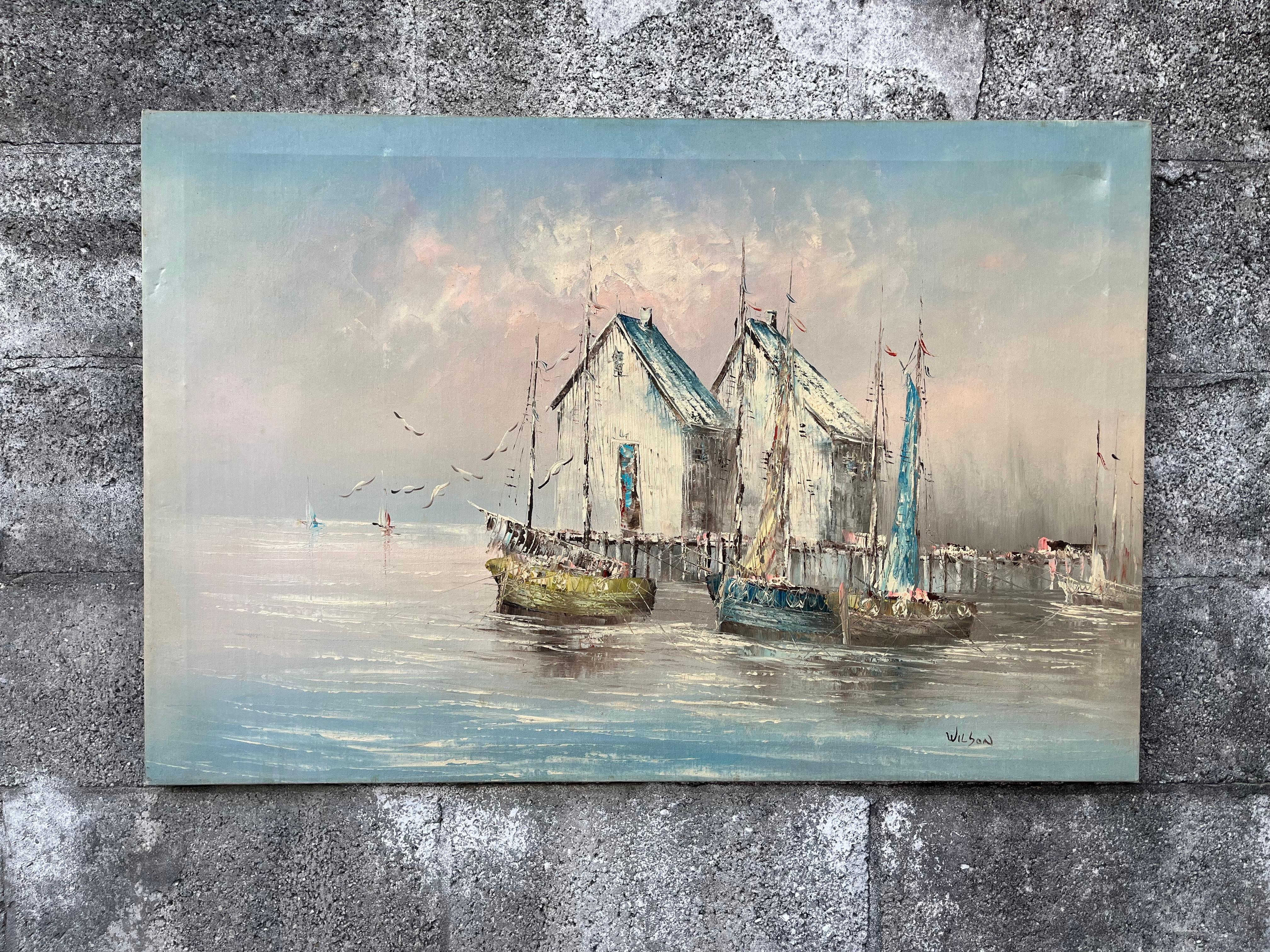 Vintage Mid-Century Modern Seascape Oil Painting Signed by the Artist, Wilson. Circa 1950s 
Features Anchored Fishing Boats painted in soft hues of grays, light blues, and white.
In good original condition with minor signs of wear consistent with