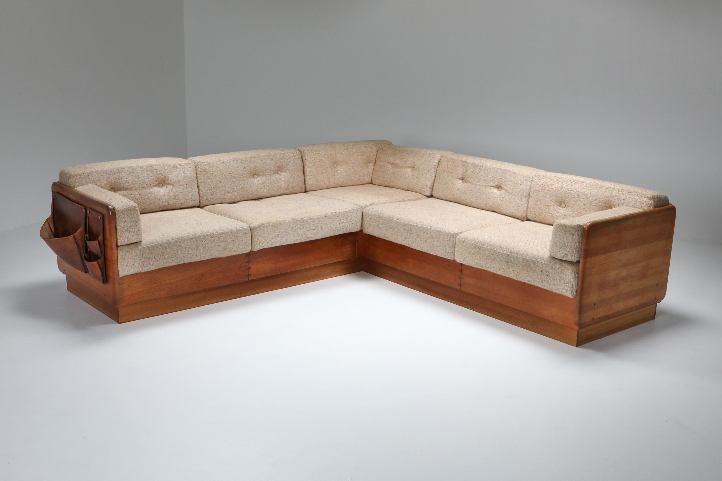 Scandinavian Modern, sectional and modular corner sofa, Mikael Laursen, Denmark, 1960s.

Solid teak wood, butterfly connections, leather newspaper holder
Cream wool upholstery.
In case you prefer another color or type of fabric, even leather