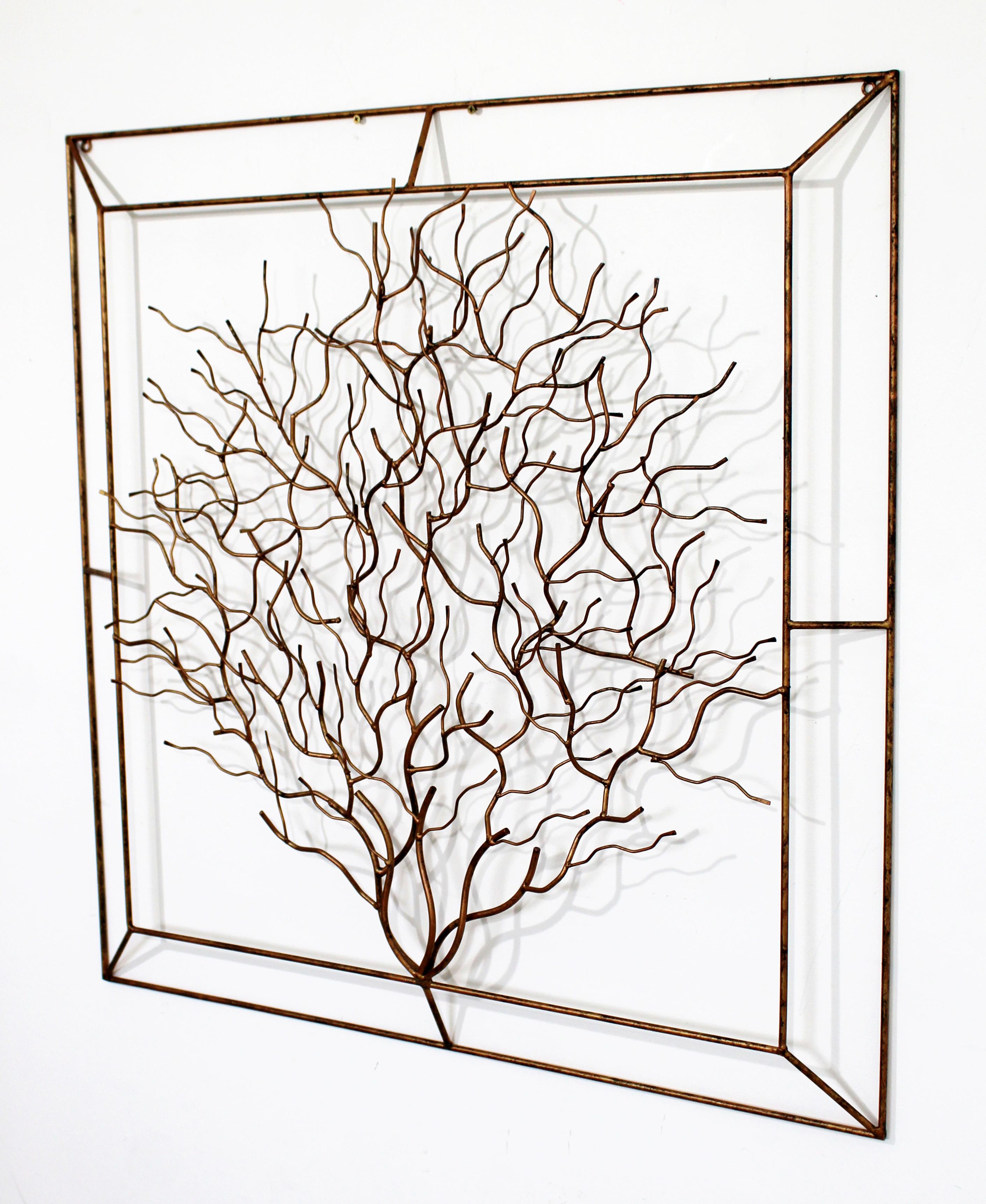 For your consideration is a marvelous, self-framed, metal wall art sculpture, of an abstracted tree, circa 1980s. In excellent vintage condition. The dimensions are 36