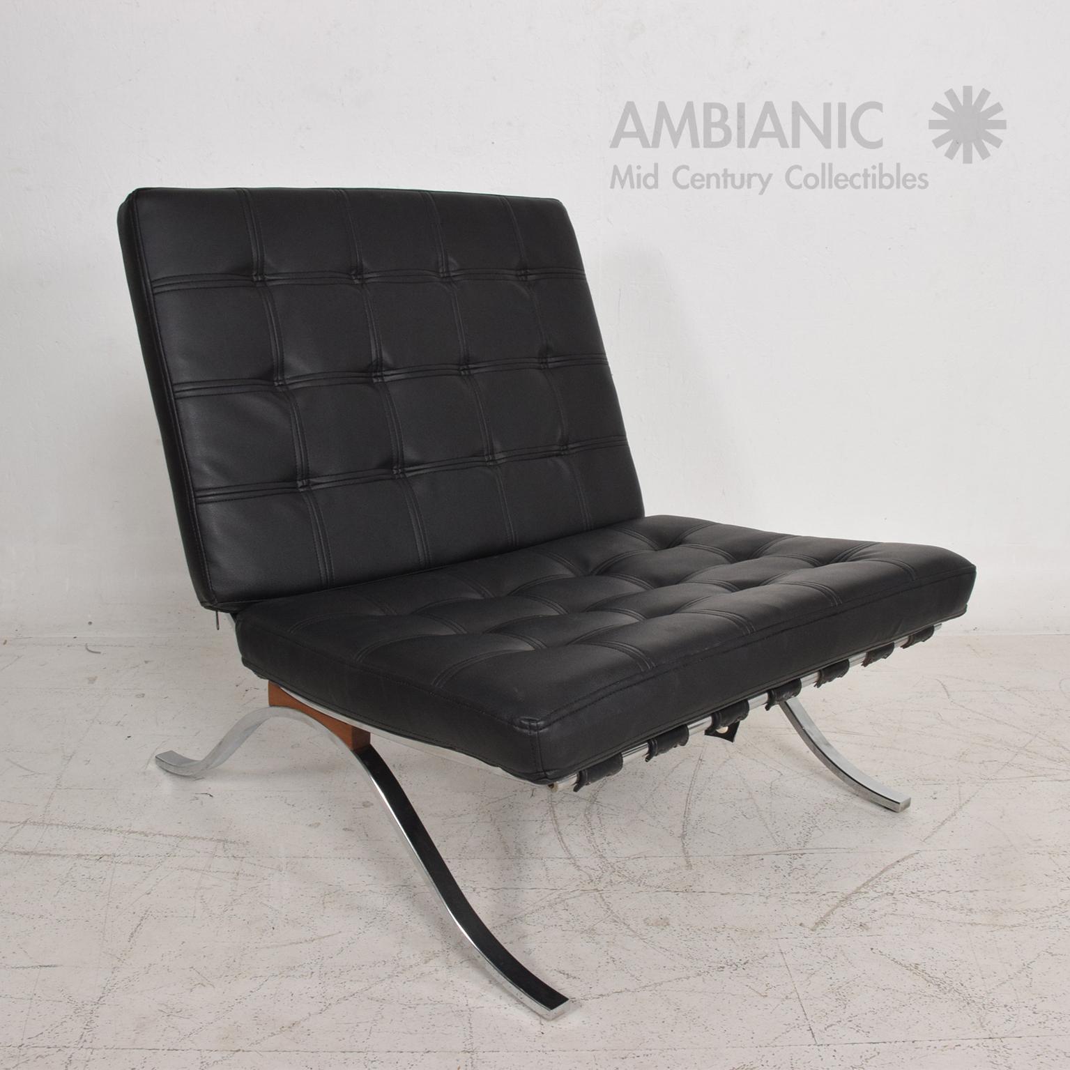 For your consideration: a vintage Lounge Chair in the Barcelona Tugendhat style designed in 1929 by Ludwig Mies van der Rohe. Offering this Mid Century Modern Classic design circa1960s done by SELIG.

Chrome-plated frame with Rosewood details