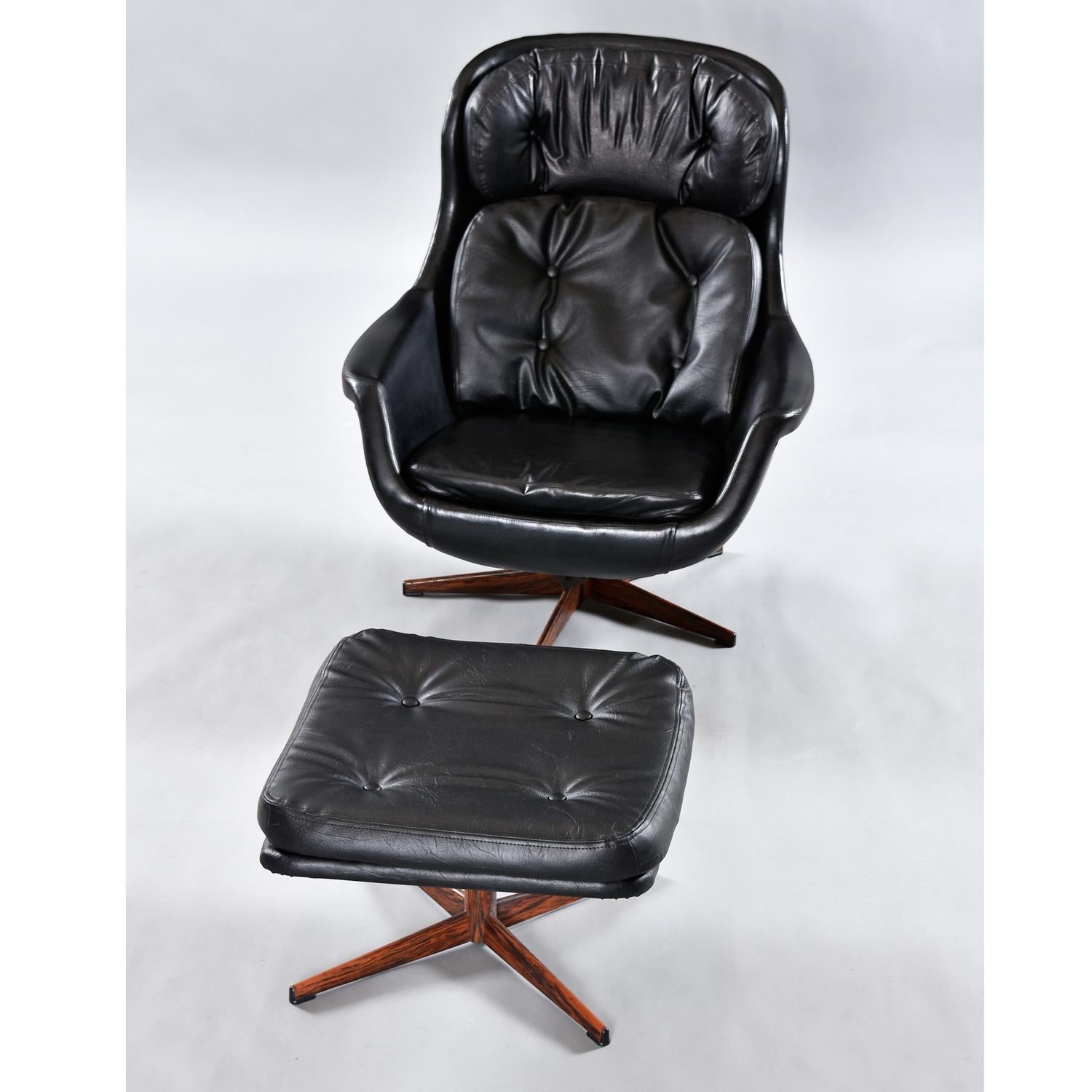 Swanky vintage 1970s pod chair recliner and ottoman manufactured by Selig Imperial in Sweden during the 1970s.  Classic, timeless, sleek modern style that will look just as cool 40 years from now.  The reclining chair tilts back and swivels.  A knob