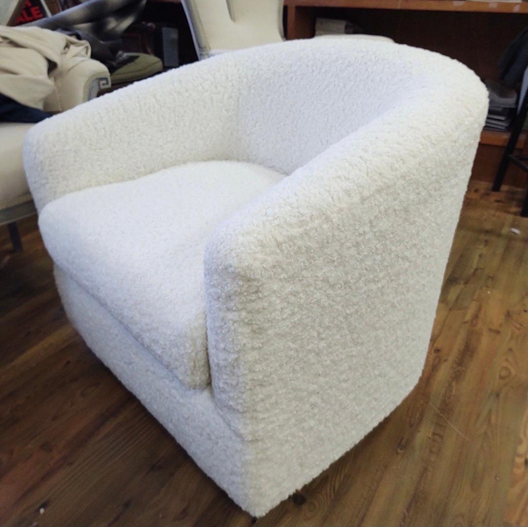 Newly upholstered in faux shearling (bouclé) and ready for its new home. In the style of Milo Baughman and made by Selig. Just the one. Now, more than ever, home is where the heart is.