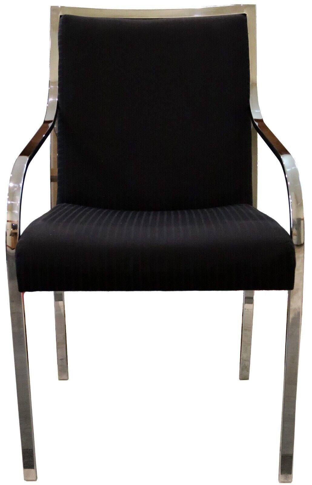 For your consideration is a stupendous set of ten, chrome and black fabric dining chairs, two with arms and eight side, circa the 1970s. In excellent vintage condition. The dimensions are 20