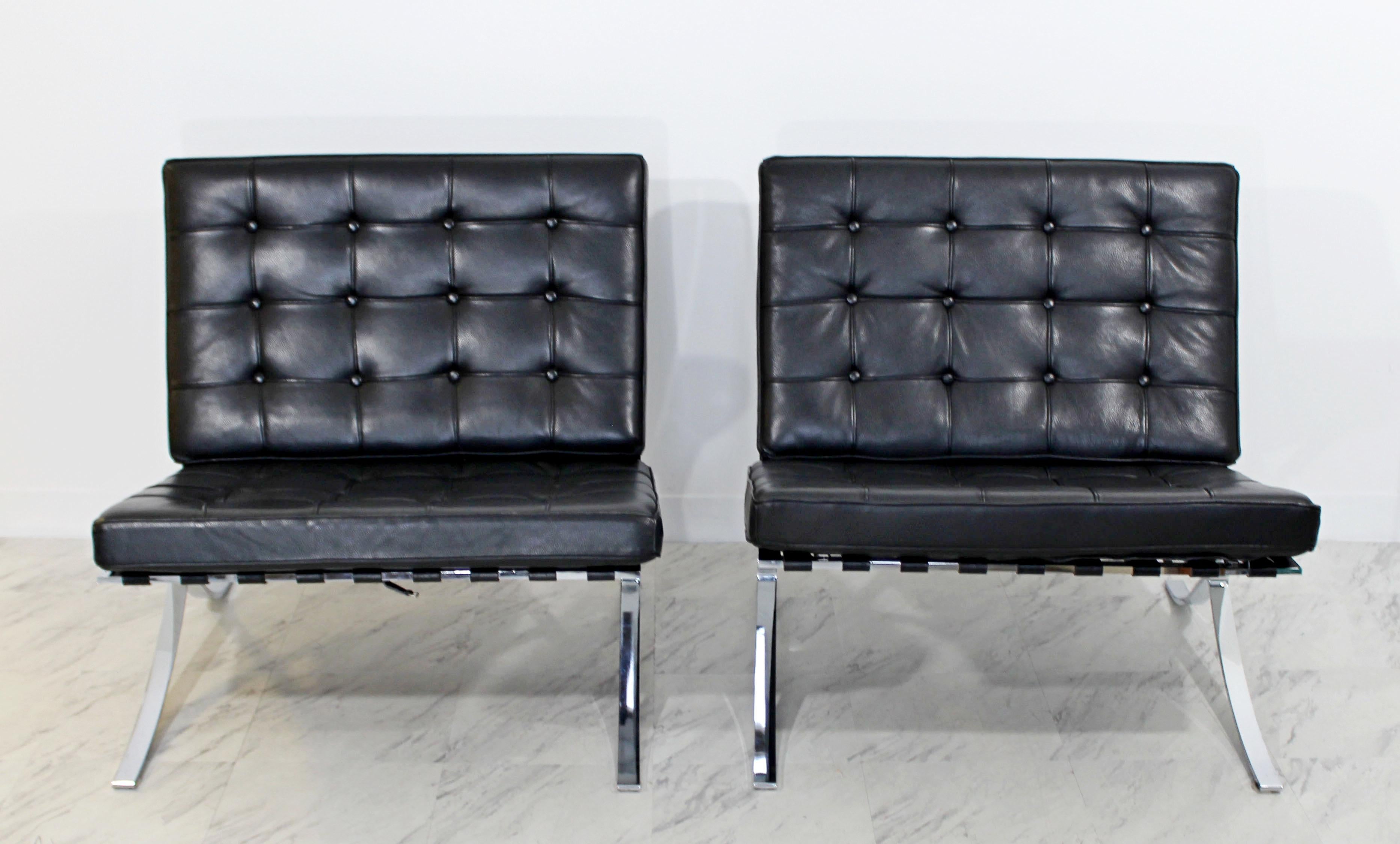 For your consideration is a wonderful set of four, chrome and tufted black leather, Barcelona style side chairs, made in Italy, circa the 1970s. In excellent condition. The dimensions are 30