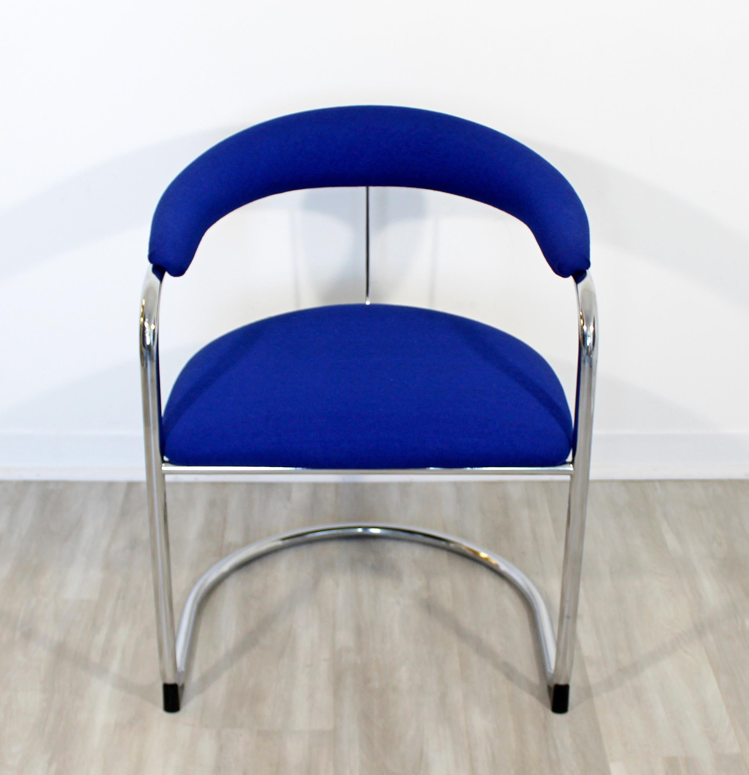 For your consideration is an utterly phenomenal set of eight, cantilevered, tubular chrome armchairs, by Anton Lorenz for Thonet, circa 1970s. Model SS33. In excellent condition. The dimensions are 23