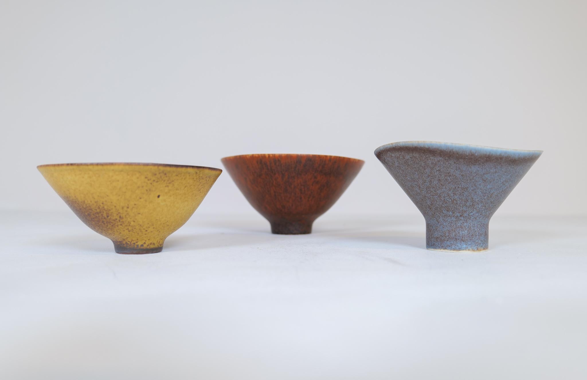 This set of 3 studio bowls was made at Rörstrand and maker / designer Carl Harry Stålhane. Made in Sweden in the mid-century. Beautiful, glazed bowls in good condition. The bowls are in three different sizes and shapes. The organic shape together