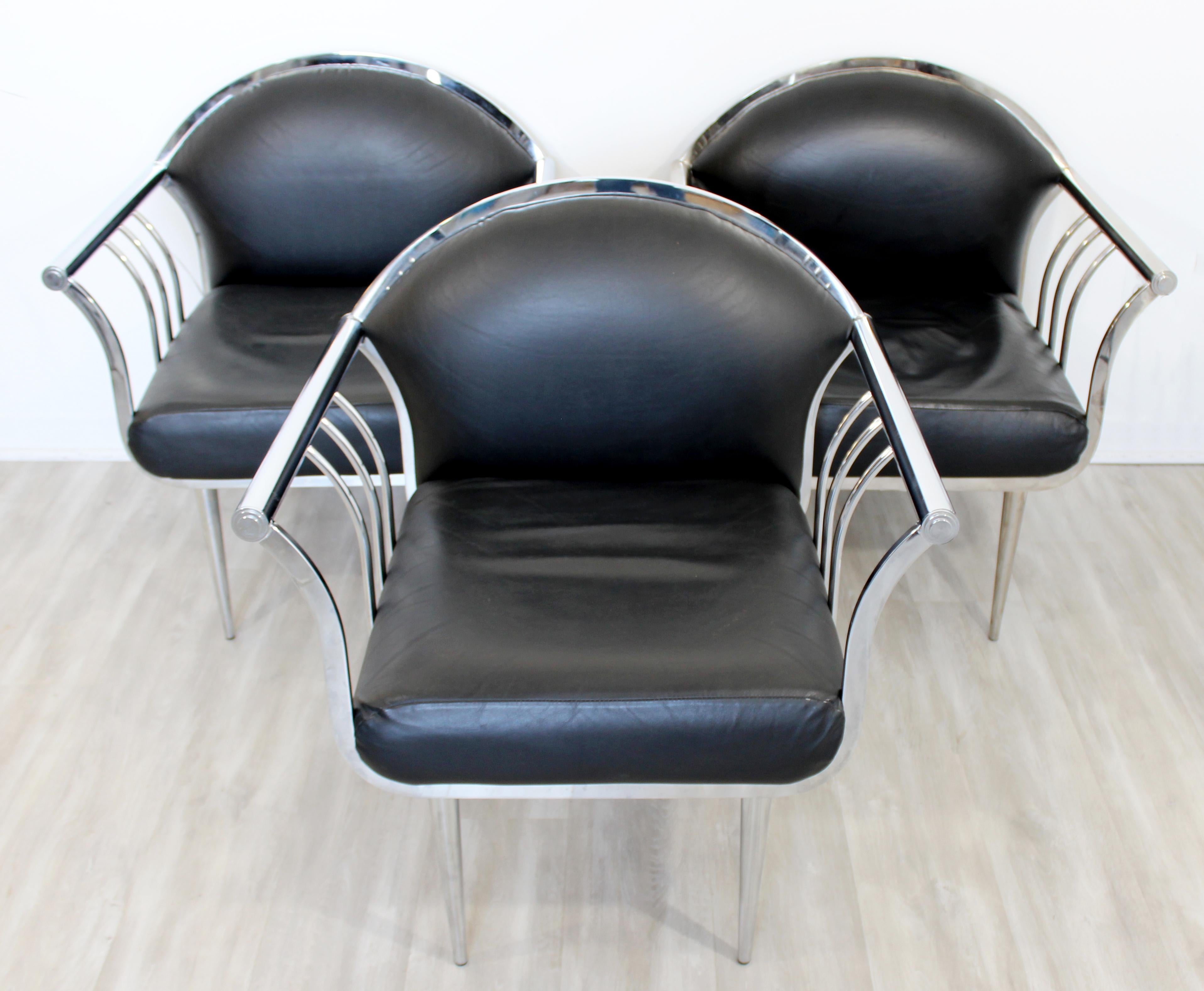 For your consideration is a gorgeous set of three, curved chrome and vinyl lounge or accent chairs, circa 1950s-1960s. In very good vintage condition. The dimensions are 28.5