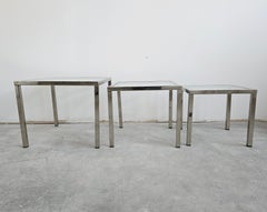 Mid Century Modern Set of 3 Nesting Tables done in Chrome with Glass Tops