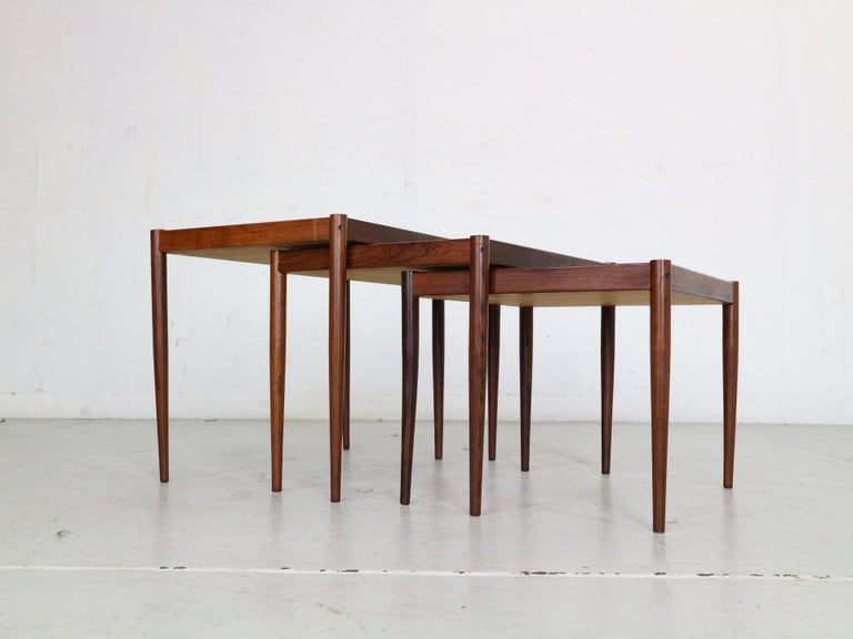 Set of 3 Danish nesting tables from the 1960s period, Denmark.
The tables are made of rosewood and can be pushed into one another on small strips of wood.
Original condition, beautiful 