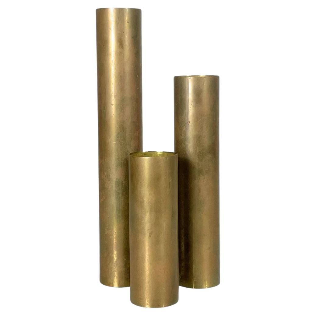 Set di 3 candelieri cilindrici in ottone d'epoca del 1960 circa in vendita
