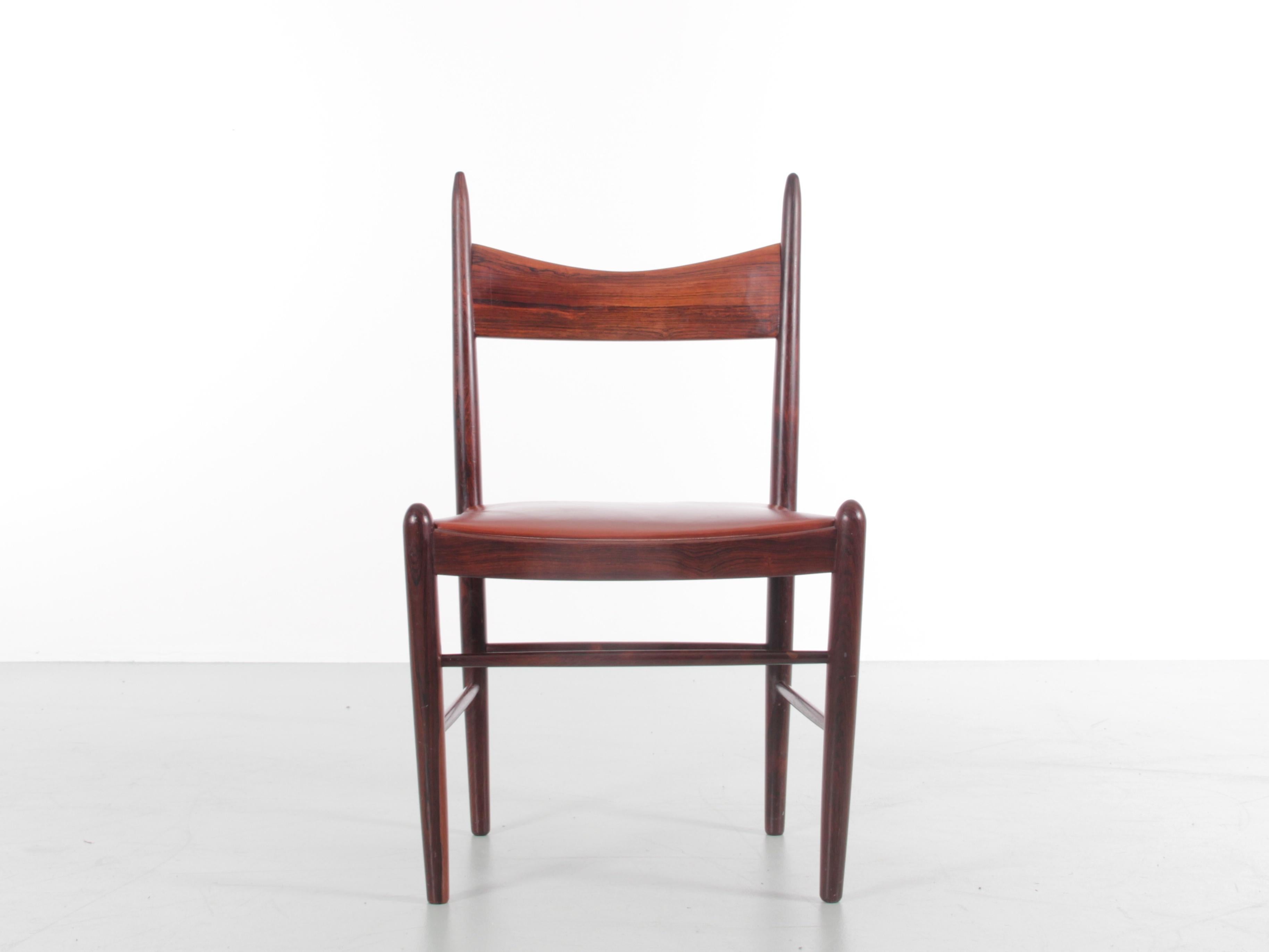 Mid-Century Modern set of 4 dining chairs in rosewood by H. Vestervig Eriksen. Original cognac leather seat.