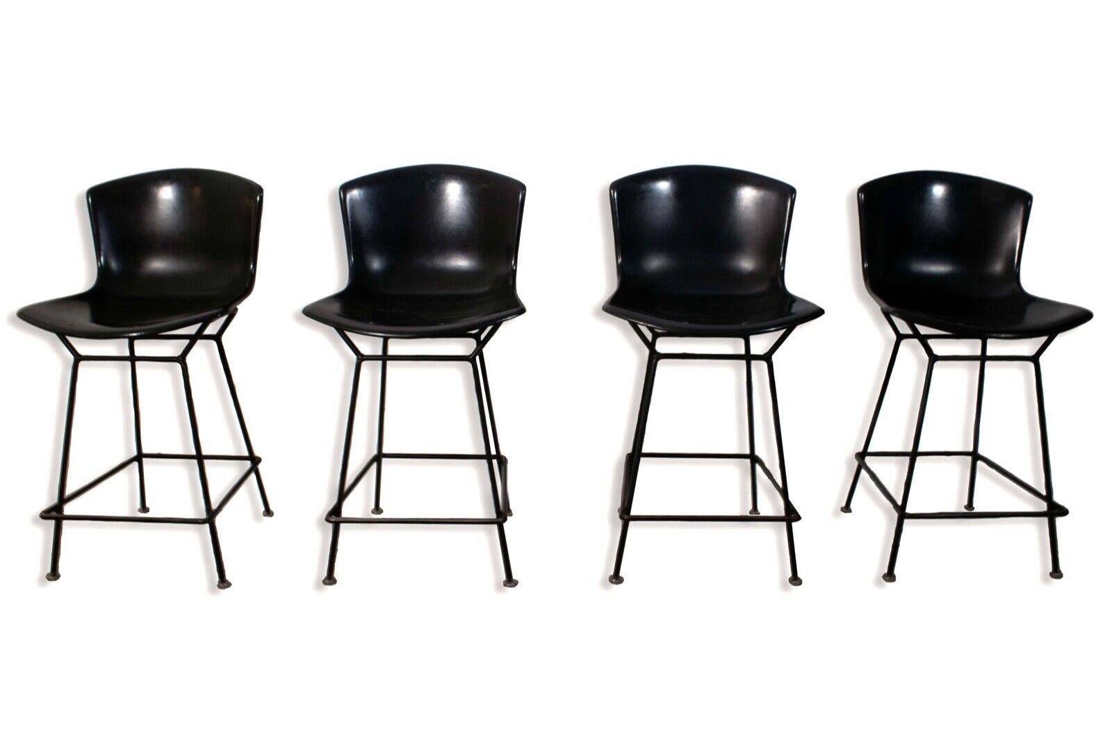 This set of five early vintage Knoll black barstools epitomizes timeless elegance and sophistication. With meticulous attention to detail, each barstool showcases the iconic design principles for which Knoll is renowned. Crafted from high-quality