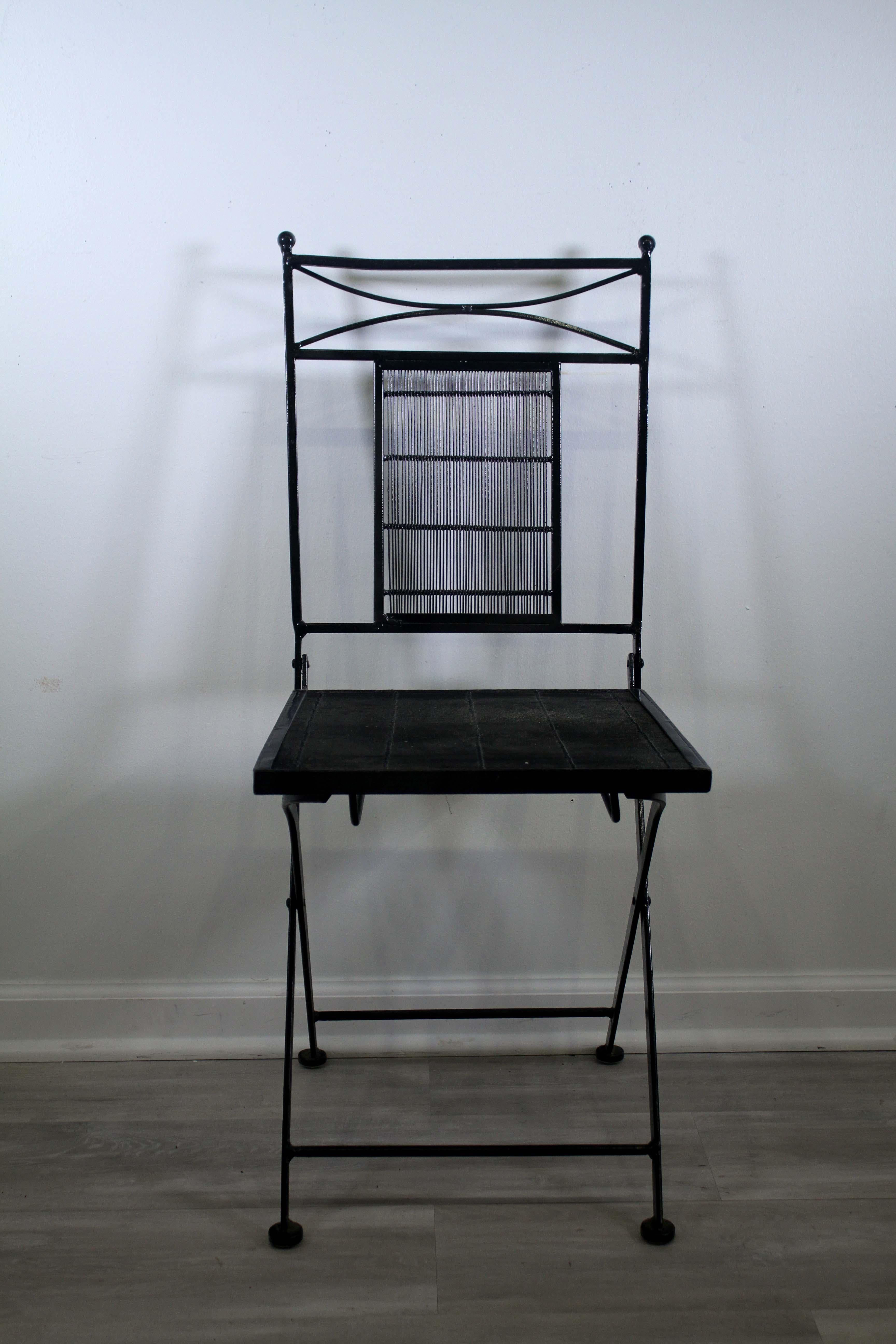 This set of 8 vintage wrought iron folding chairs will add a touch of Classic elegance to your home. The sturdy iron frames feature intricate woven like work and a Classic design. The chairs fold flat for easy storage, making them perfect for extra