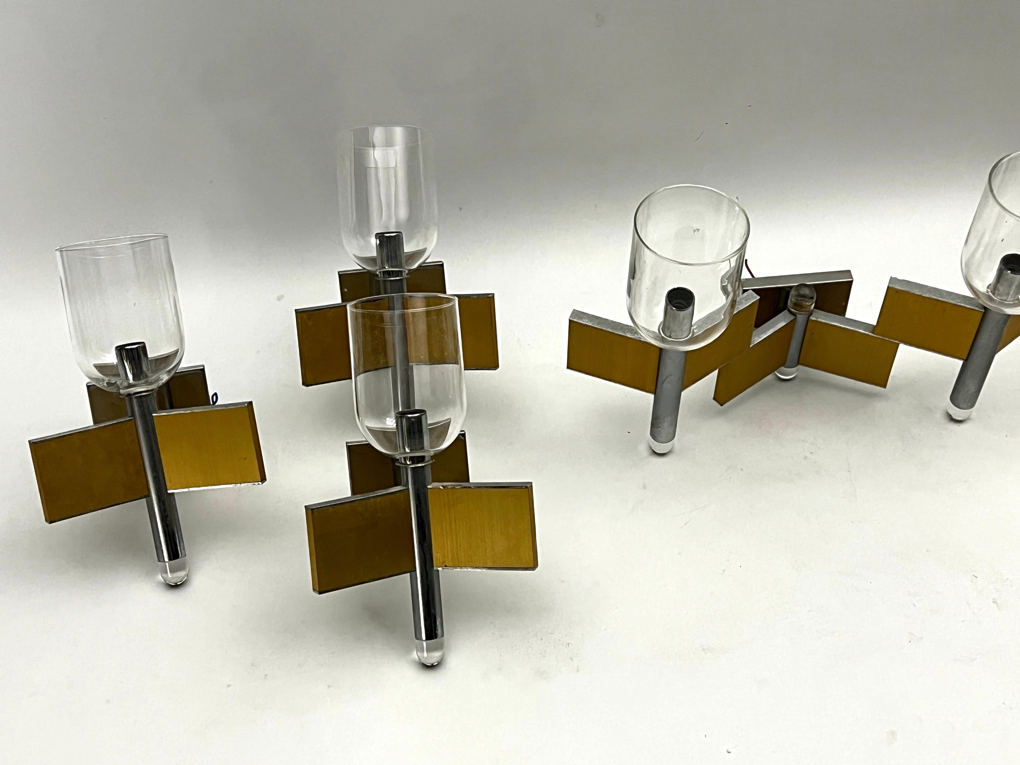 Brass Mid-Century Modern set of eight brass and chrome sconces by Sciolari. Italy 1970 For Sale