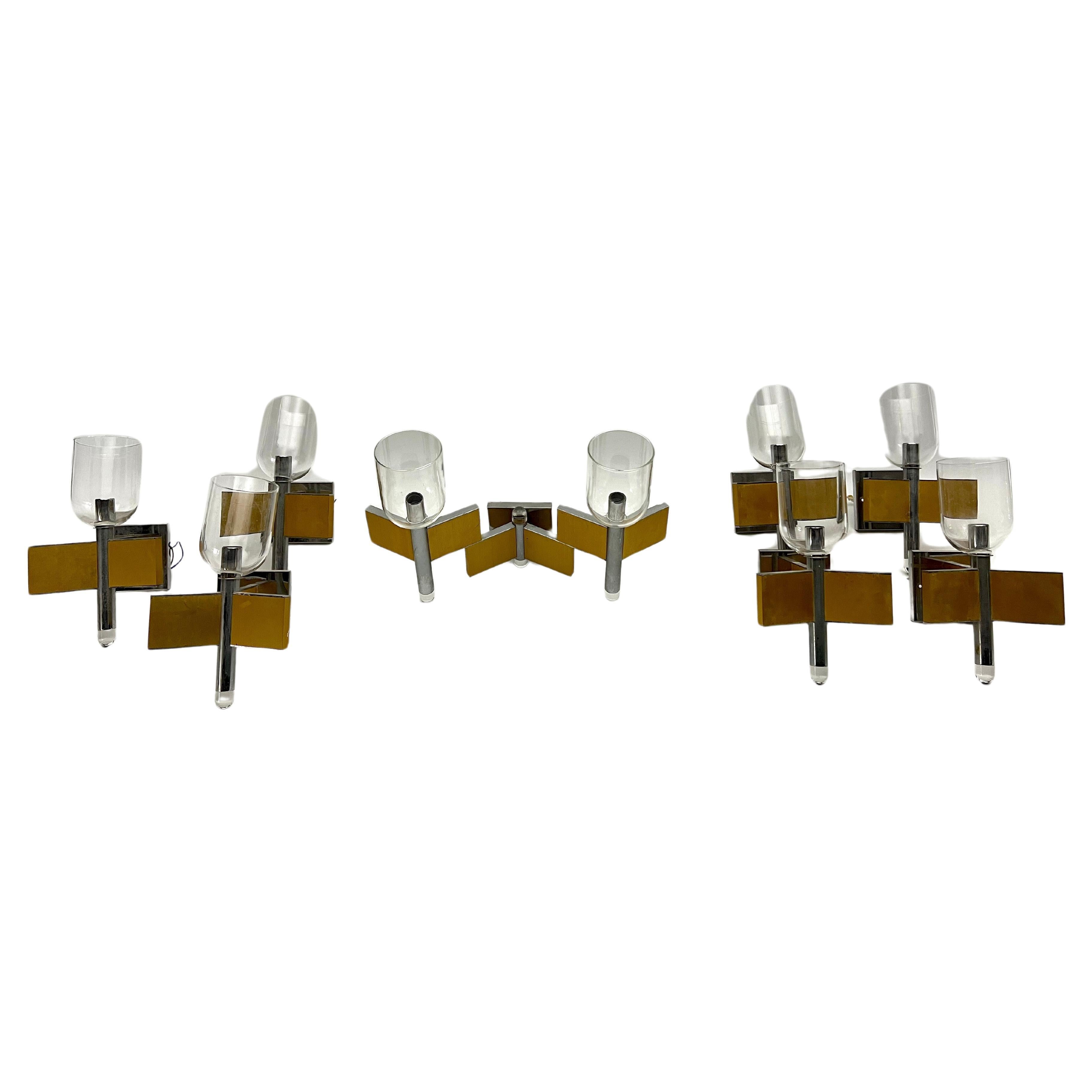Mid-Century Modern set of eight brass and chrome sconces by Sciolari. Italy 1970 For Sale