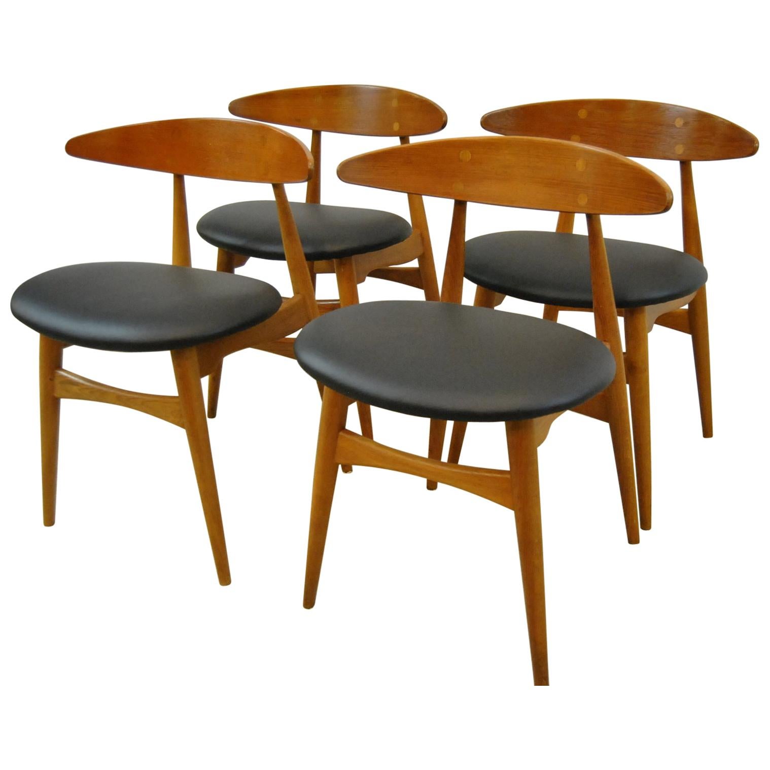 Mid-Century Modern Set of Four Hans Wegner Teak Dining Chairs, Model CH33