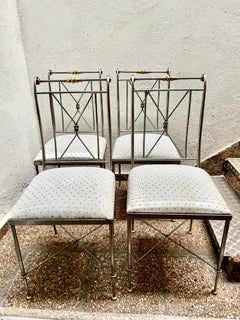 Set di quattro sedie in acciaio e ottone di Alberto Orlandi, in stile Mid Century Modern.