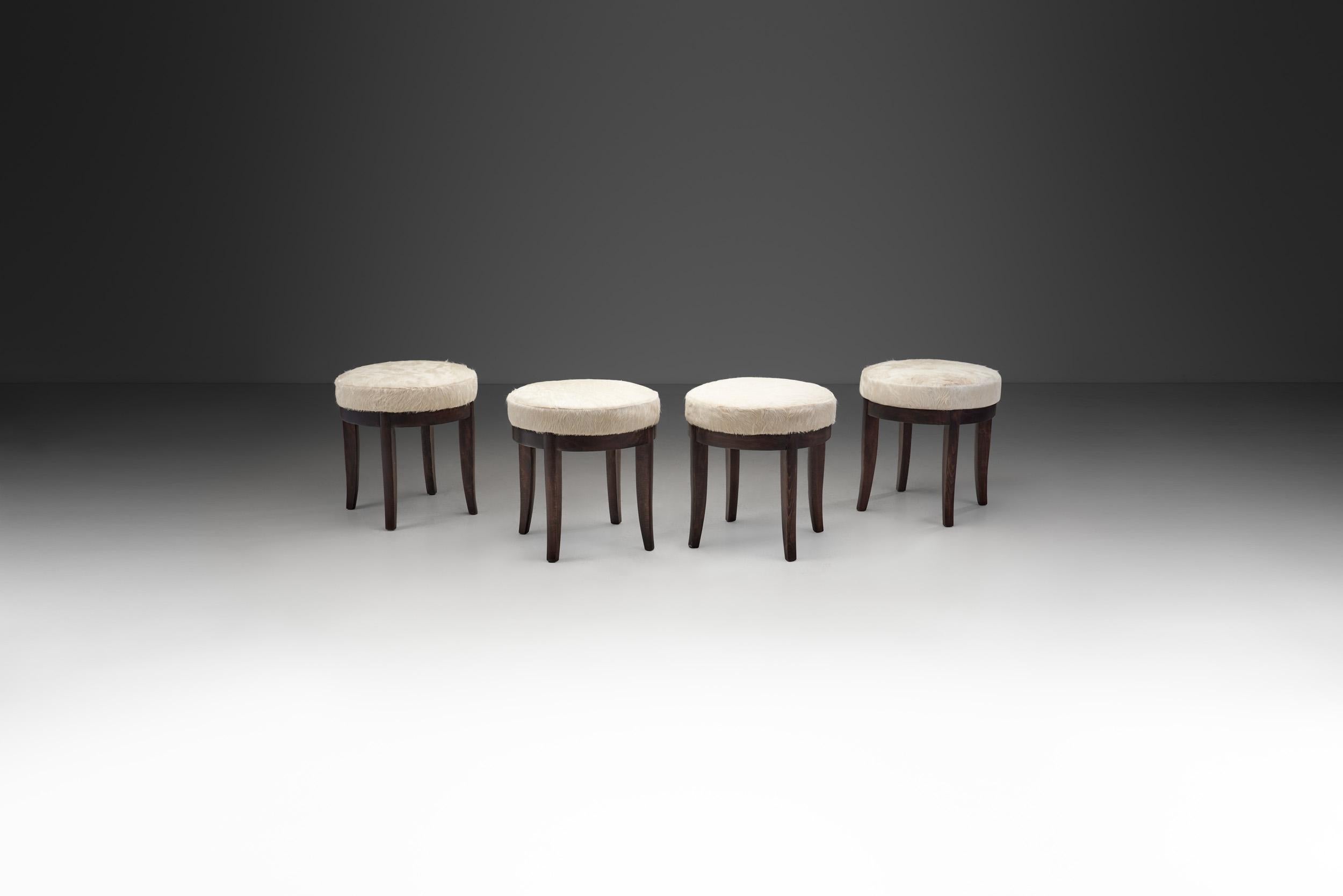 European Mid-Century Modern Set of Four Stools in Cowhide, Europe, ca 1950s For Sale