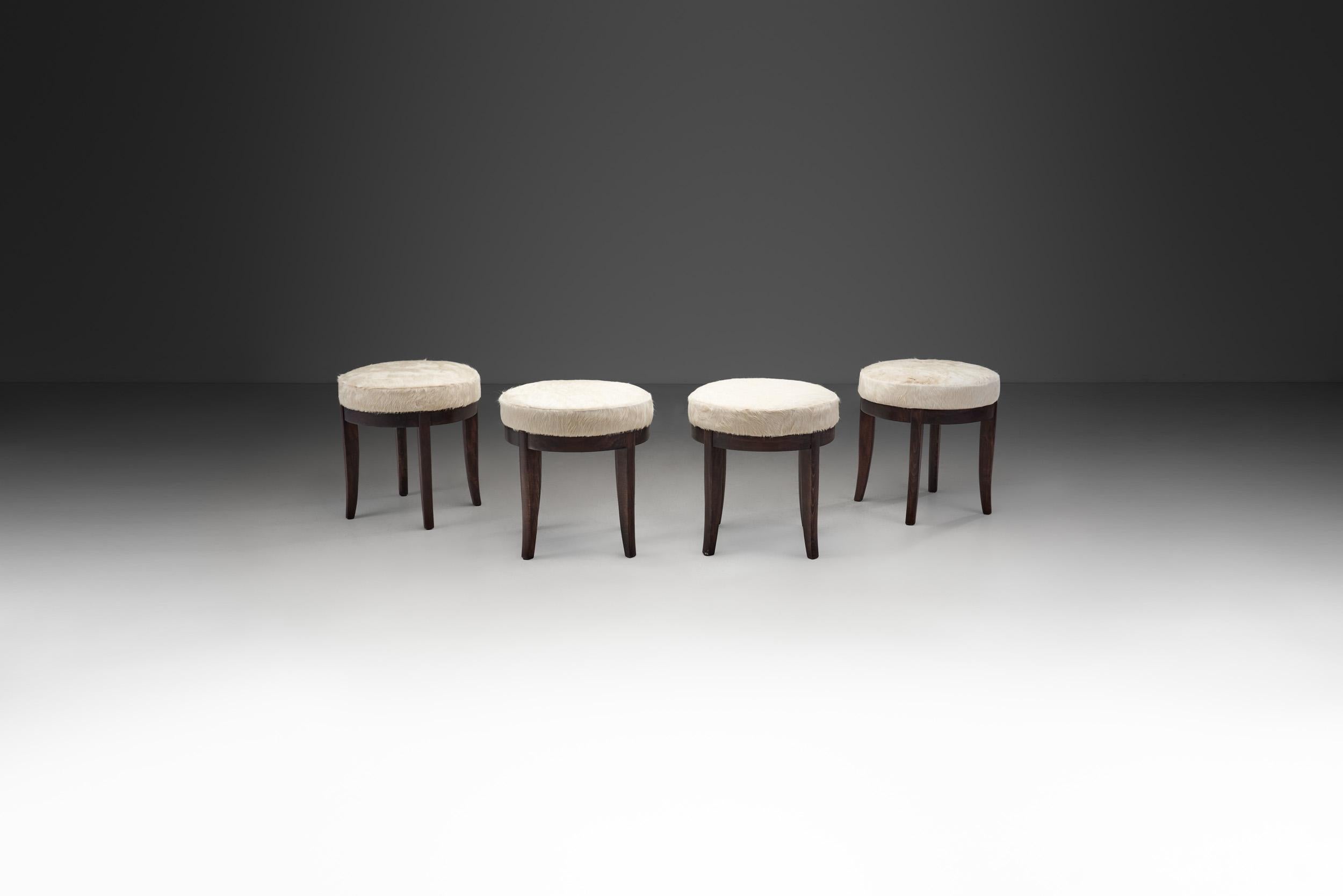 Mid-20th Century Mid-Century Modern Set of Four Stools in Cowhide, Europe, ca 1950s For Sale
