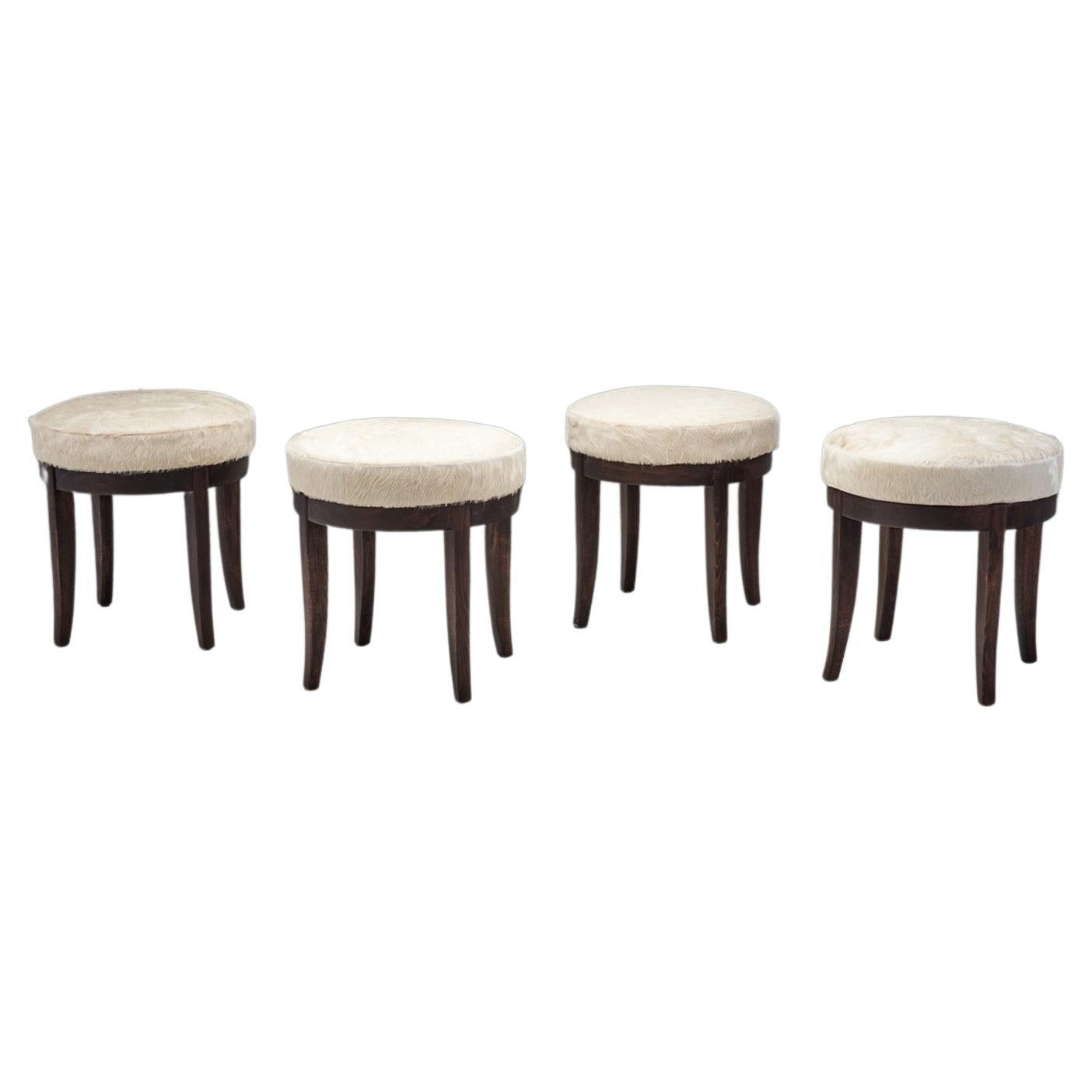 Mid-Century Modern Set of Four Stools in Cowhide, Europe, ca 1950s