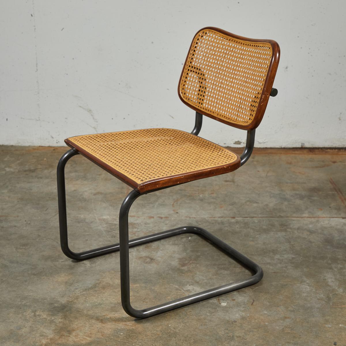 Mid-Century Modern Set of Four Vintage Caned Metal Dining Chairs In Good Condition In Los Angeles, CA