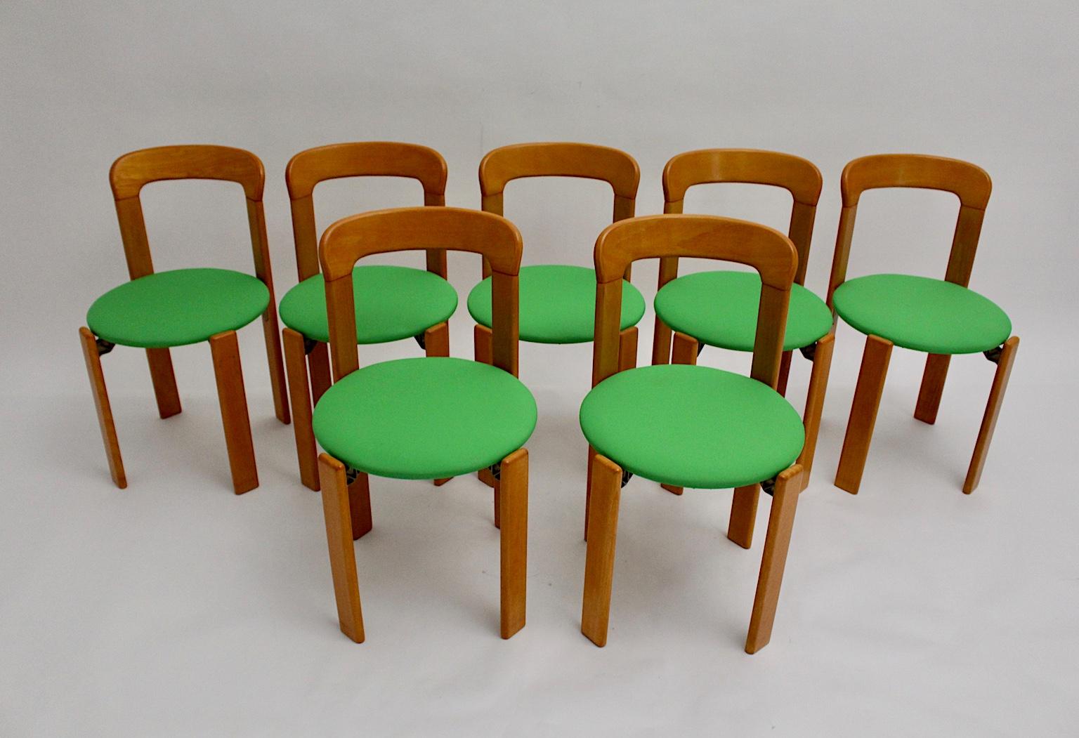 The set of seven dining room chairs were designed by Bruno Rey 1970s Switzerland and executed by Dietiker.
The dining room chairs were made of solid beech, laminated plywood beech and cast aluminum. Furthermore the stackable dining room chairs by