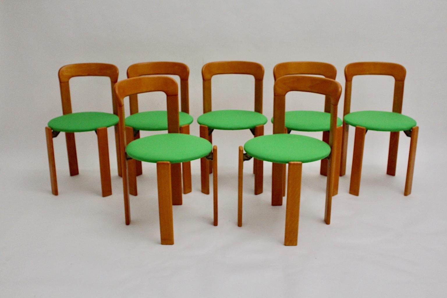 Swiss Mid-Century Modern Set of Seven Brown Wood Dining Room Chairs by Bruno Rey 1970s