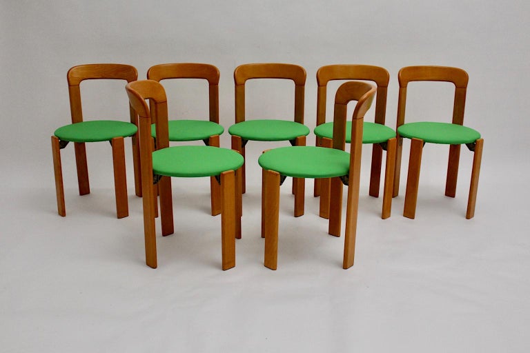 Late 20th Century Mid-Century Modern Set of Seven Brown Wood Dining Room Chairs by Bruno Rey 1970s