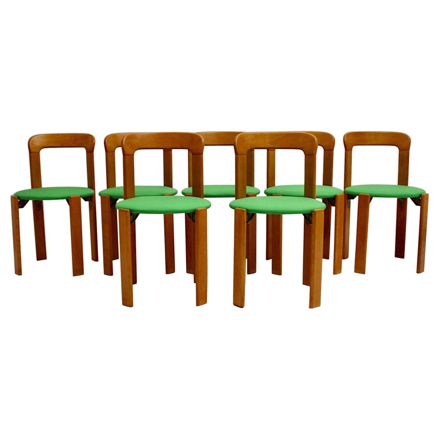 Mid-Century Modern Set of Seven Brown Wood Dining Room Chairs by Bruno Rey 1970s