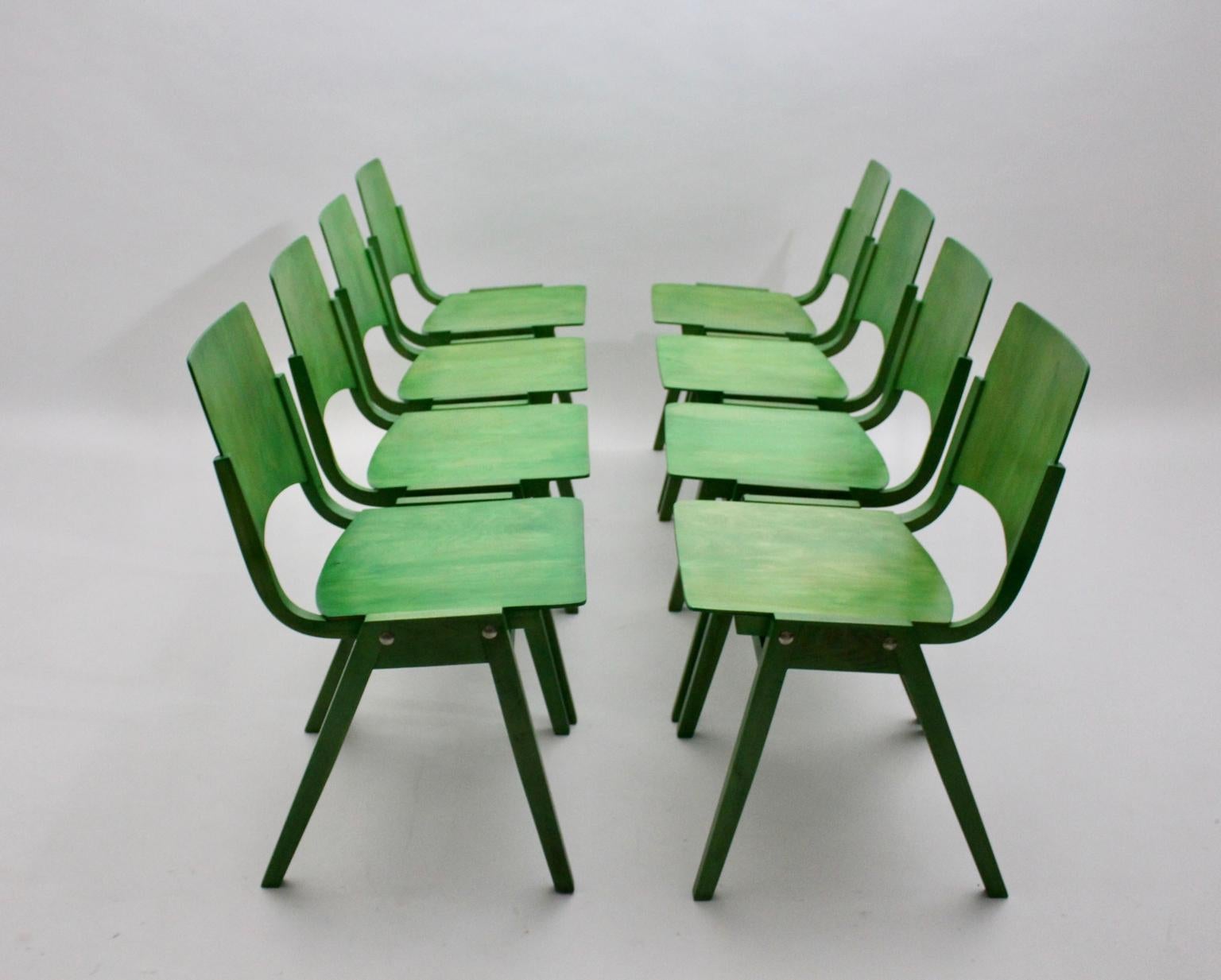 Austrian Mid-Century Modern Set of Twelve Green Vintage Dining Chairs P7 by Roland Rainer For Sale