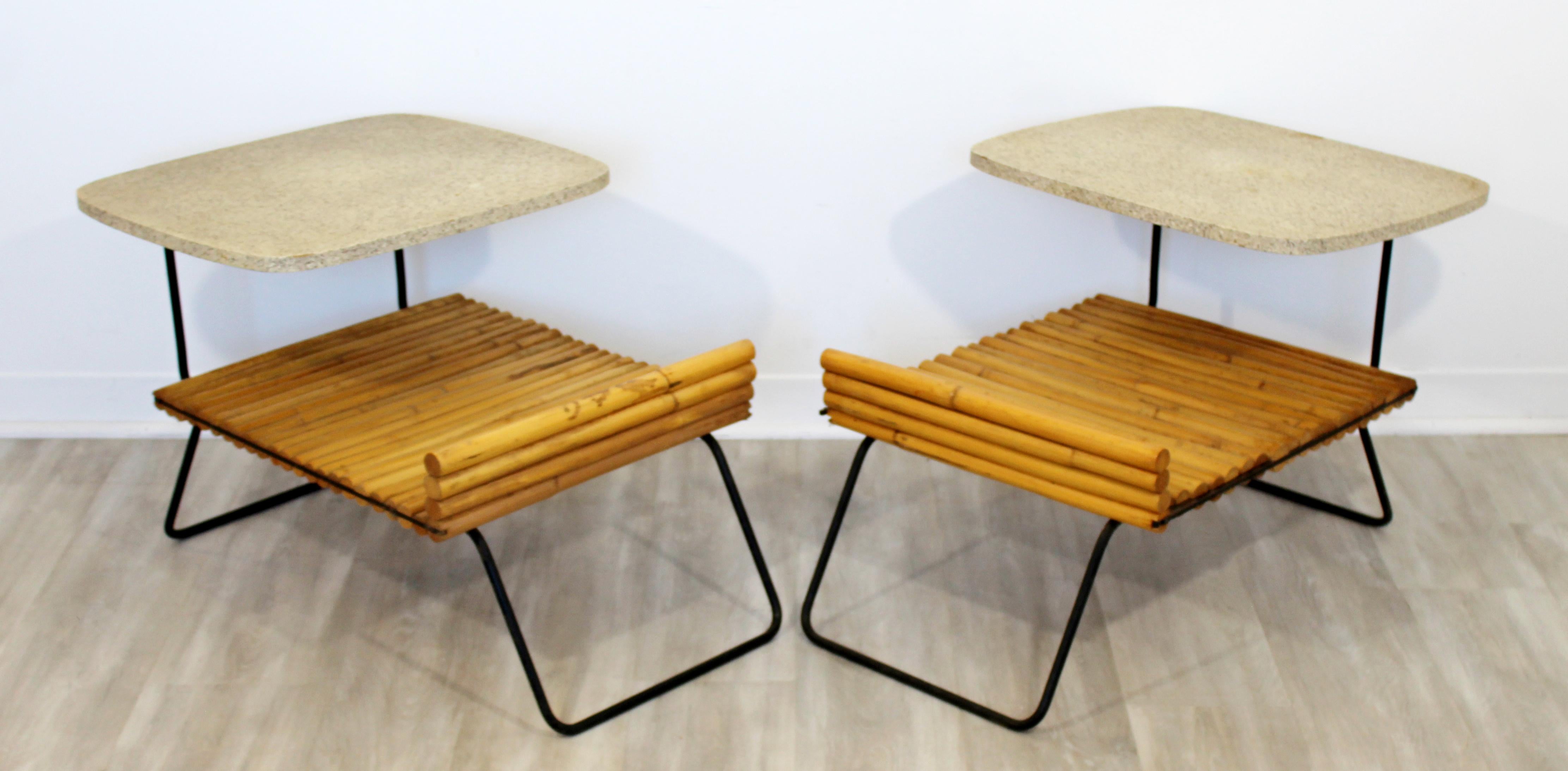 For your consideration is a fabulous pair of bamboo and wrought iron, two tiered side or end tables, by Herbert and Shirley Ritts, circa the 1950s. In good vintage condition. The dimensions are 19.5