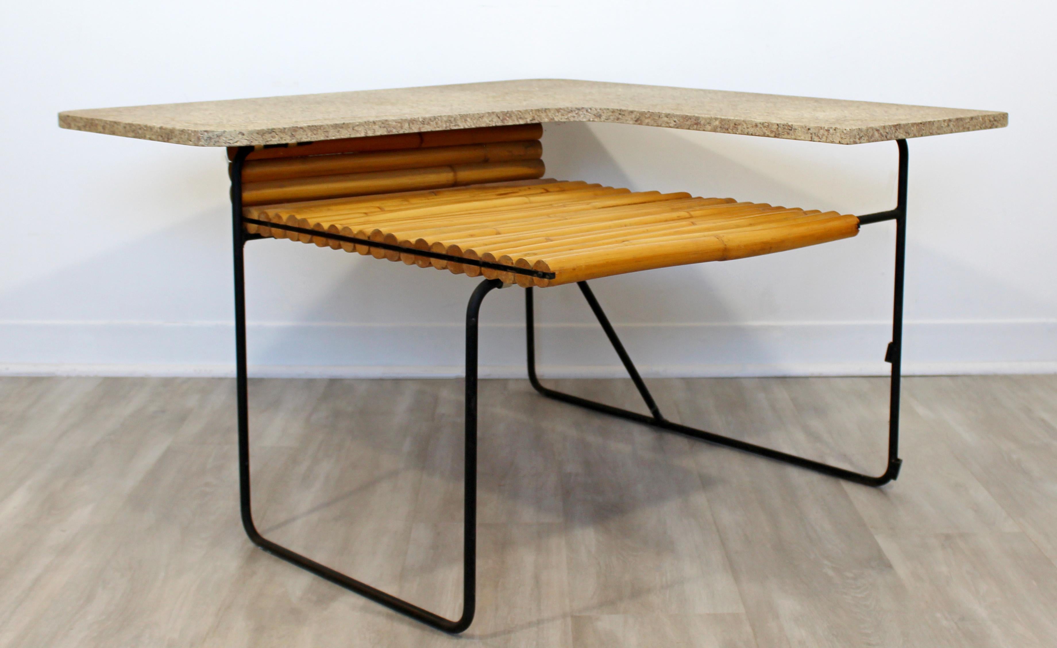 For your consideration is a sensational, bamboo and wrought iron, two-tiered coffee table, by Herbert and Shirley Ritts, circa 1950s. In good vintage condition. The dimensions are 35