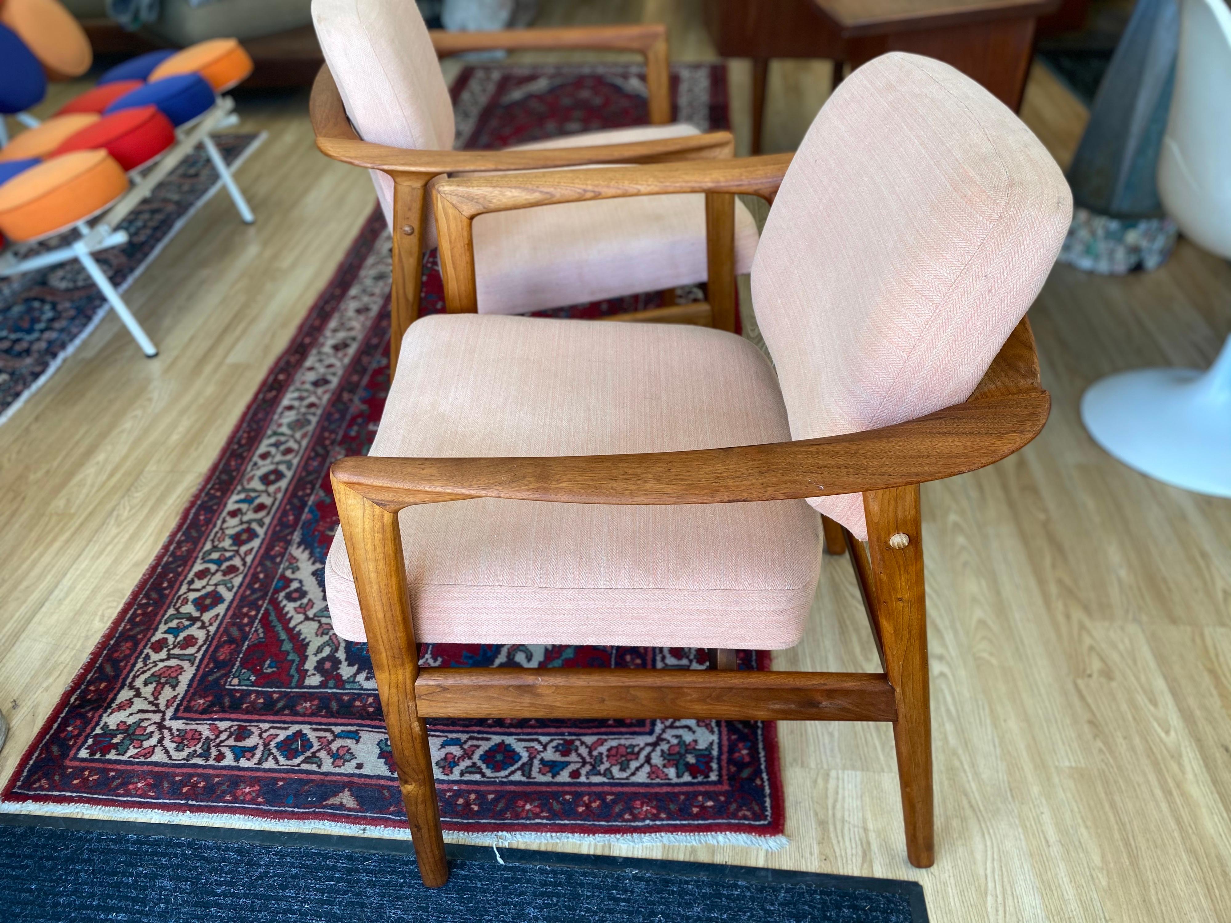 Beautiful vintage sculpted side chairs made of teak by Dux of Sweden. These Swedish modern chairs, circa 1960s feature an elegant rounded back with nice clean lines. The base of the chairs is in great condition; we recommend a deep clean or
