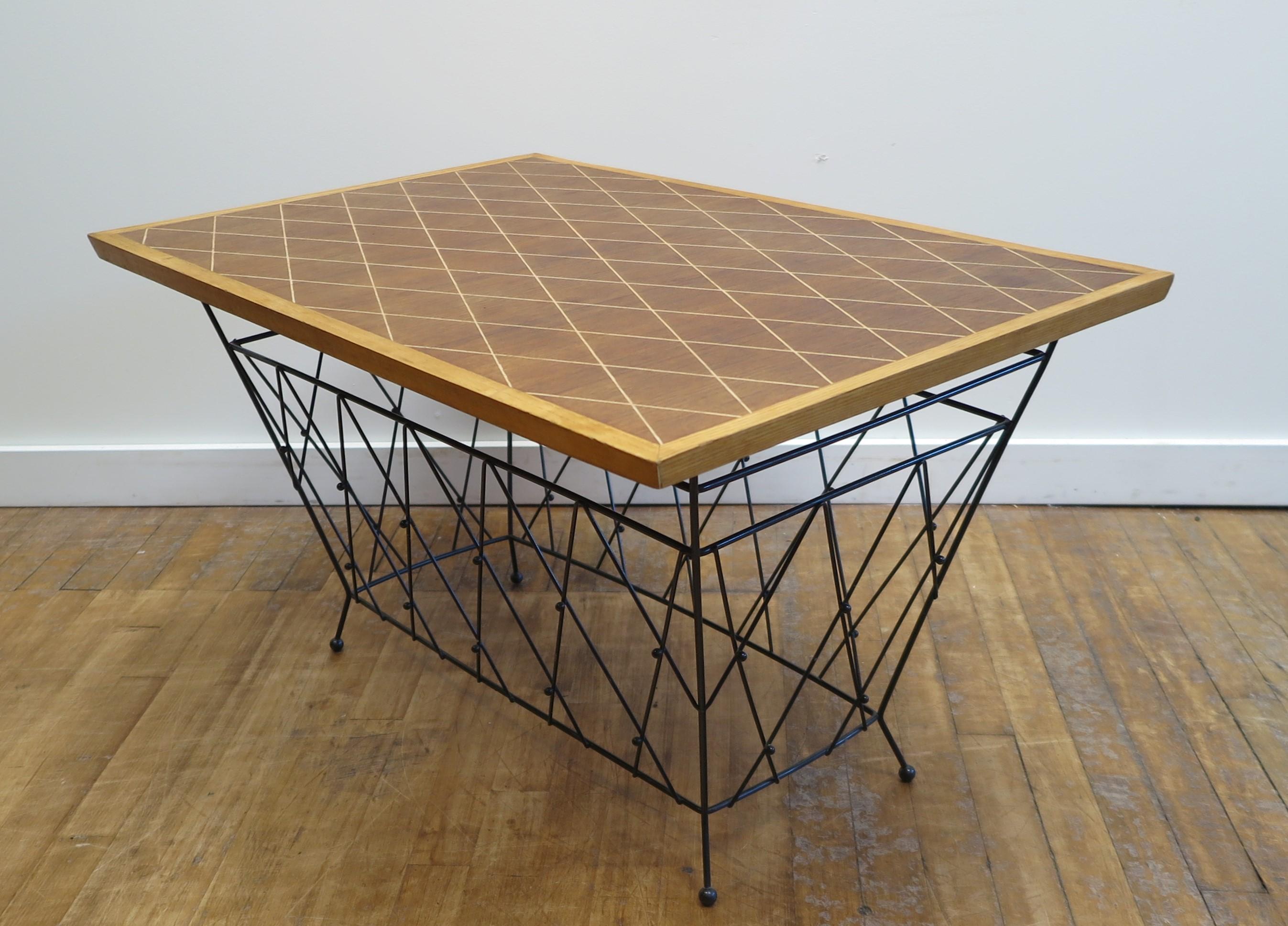 Mid Century Modern cocktail Table Side Table.  A French Marquetry inlay top set on steel metal cage X base design frame with incorporated legs.  Modern geometric inlay pattern to the wooden top.  Corresponding design to the metal base accented with