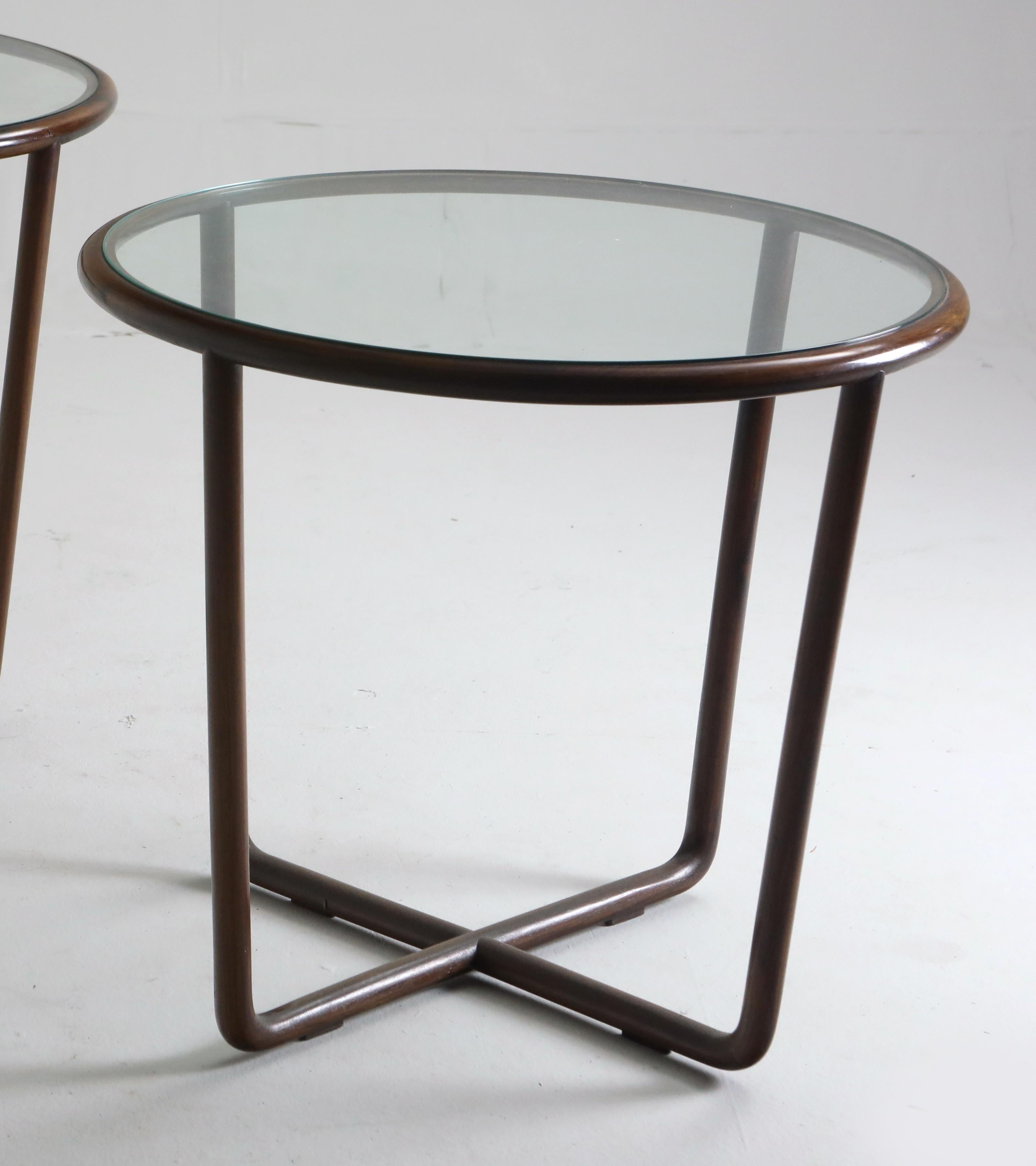Mid-Century Modern side table in wood and round glass top designed by Joaquim Tenreiro in 1950s.