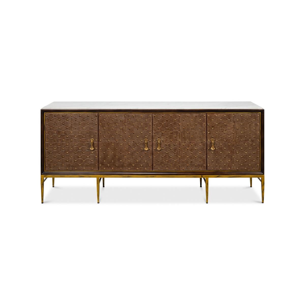 This beautifully crafted sideboard is a striking example of mid-century modern design reimagined for contemporary living. The unit features rich, dark tones contrasted by the Italian Satuario Marble top and gilded highlights.

The front of the