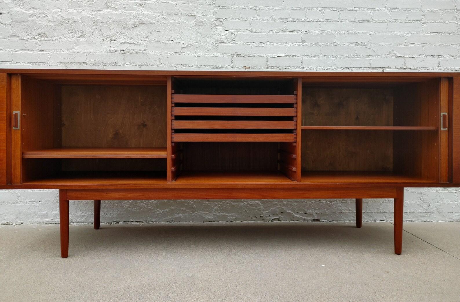 Mid Century Modern Sideboard by Jens Quistgaard for Loving Neilsen

Above average vintage condition and structurally sound. Has some expected slight finish wear and scratching. 

Additional information:
Materials: Teak
Vintage from the