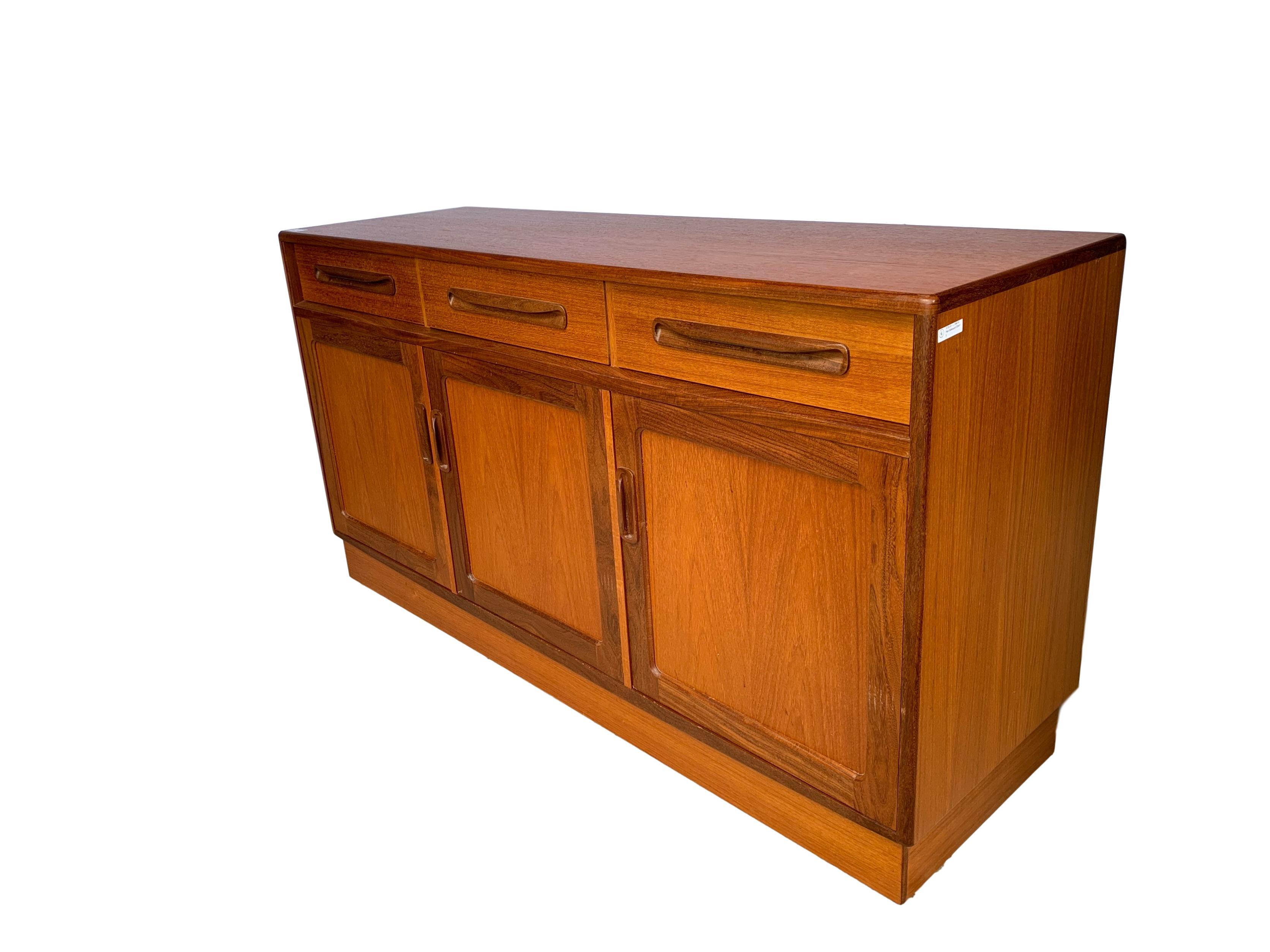 G-Plan Mid-Century Modern sideboard cabinet, teak, English, circa 1965. This piece is made to the highest quality standards. Lovely color and size.