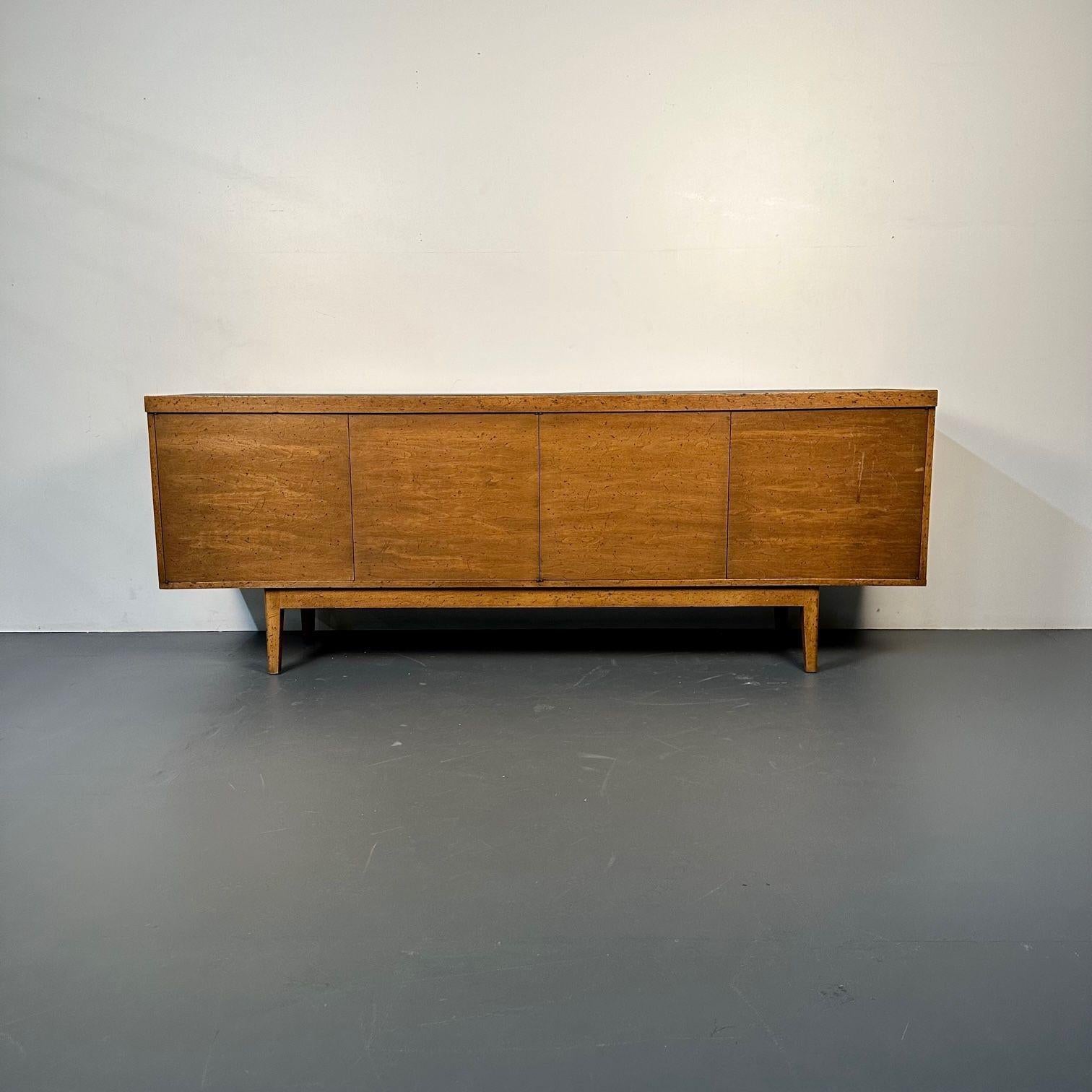 Mid-Century Modern Sideboard / Credenza, Rustic Provincial Cabinet, Slate Top
 
Mid-century cabinet in the style of Paul McCobb having four swinging doors and a single piece slate top. A sleek floating leg base supporting an upper cabinet having a