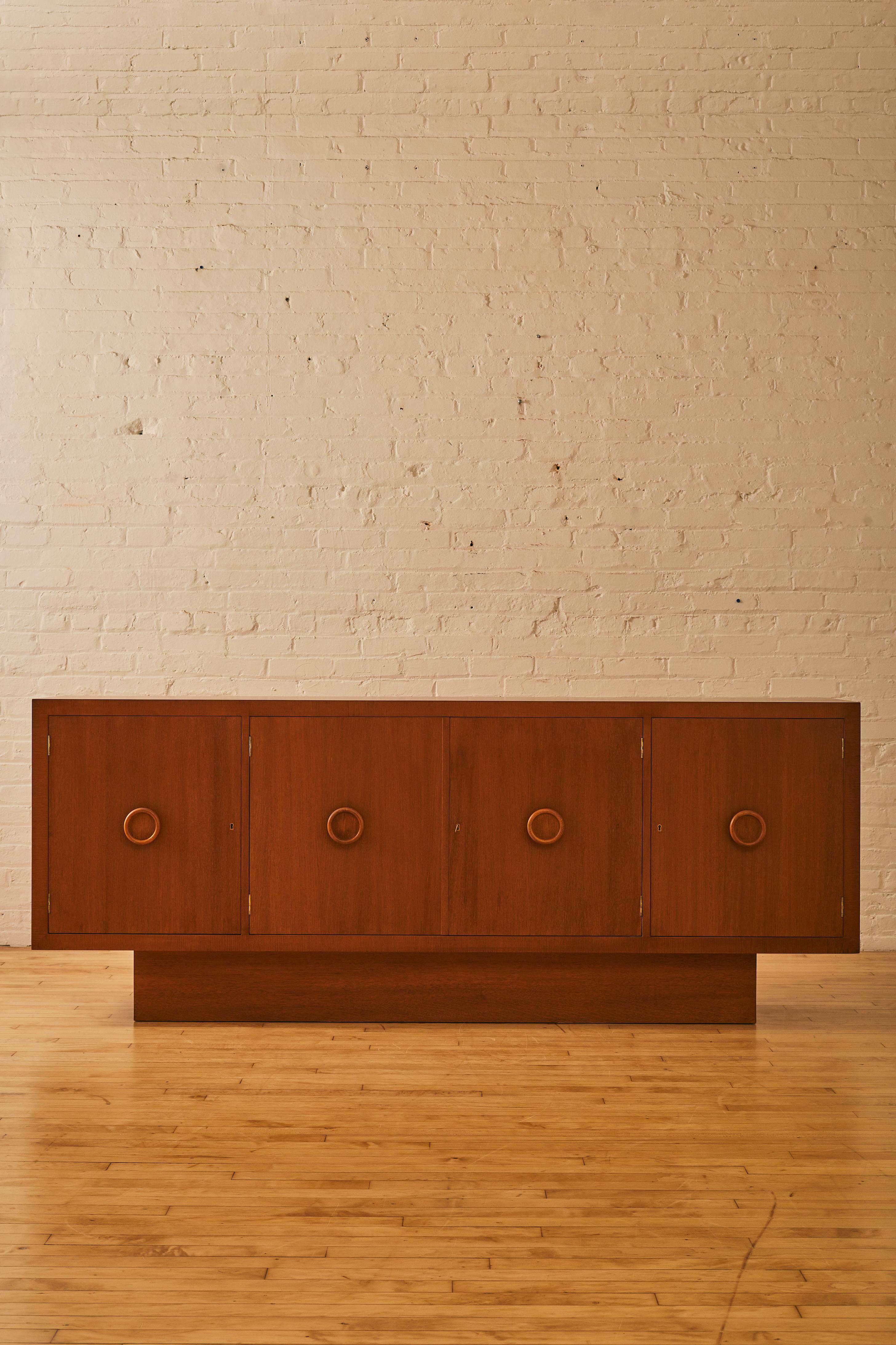 Mid-Century Modern Sideboard with round pull handles.

  