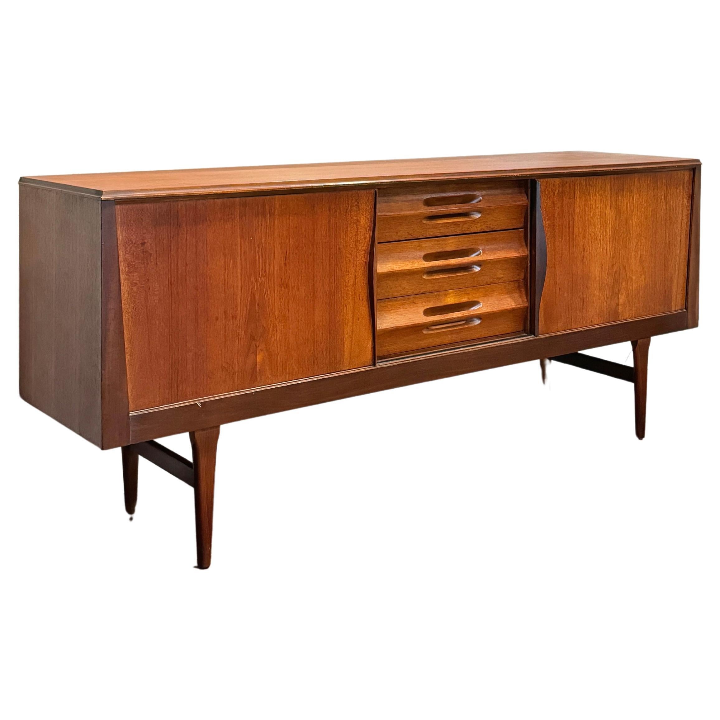 Mid century modern sideboard made of teak, circa 1960’s For Sale