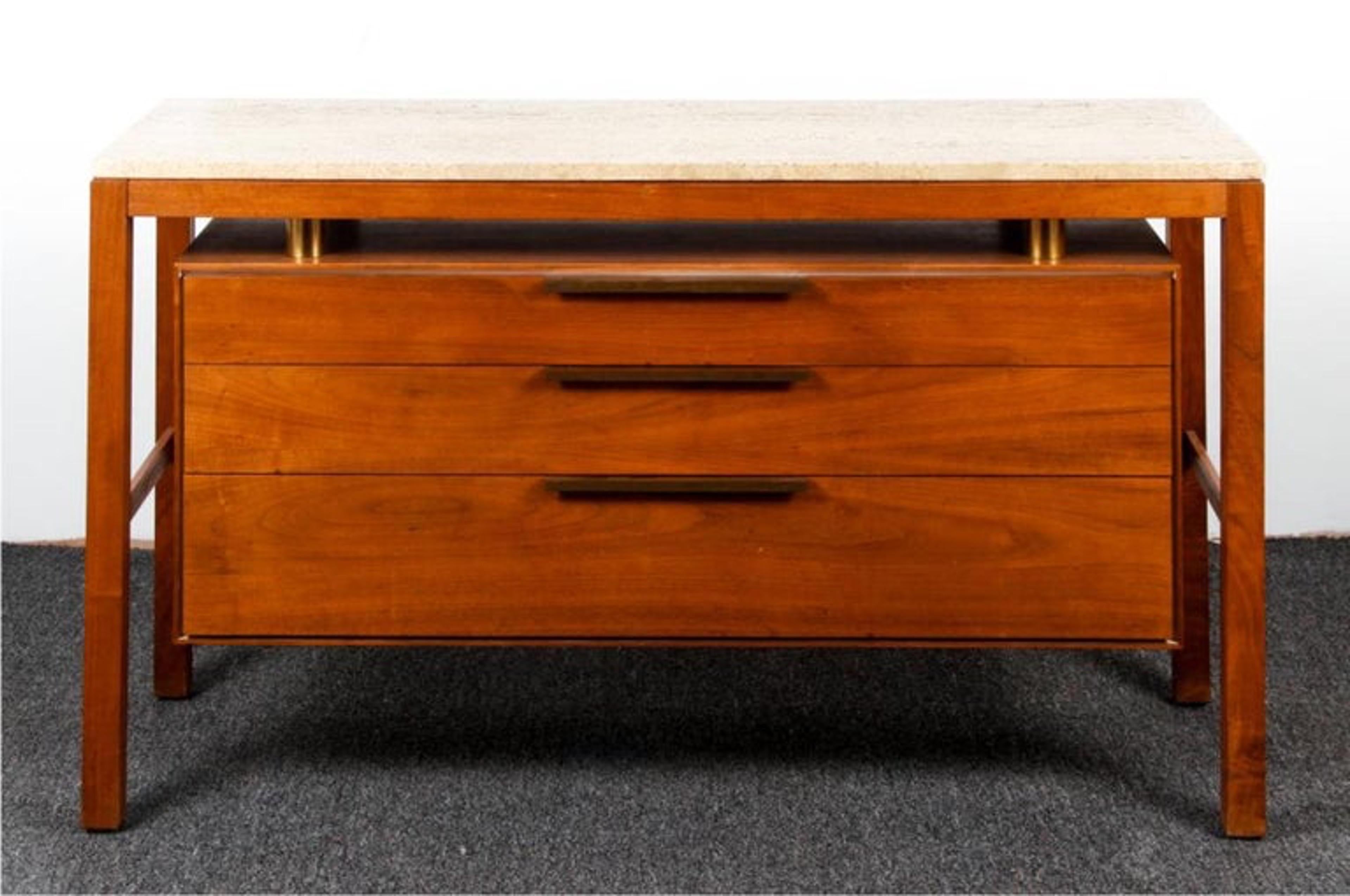 Presenting a remarkable pair of custom Mid-Century Modern sideboards/cabinets meticulously crafted by the renowned designer Vladimir Kagan in 1961. These exquisite pieces are constructed from rich walnut and feature elegant travertine tops that add