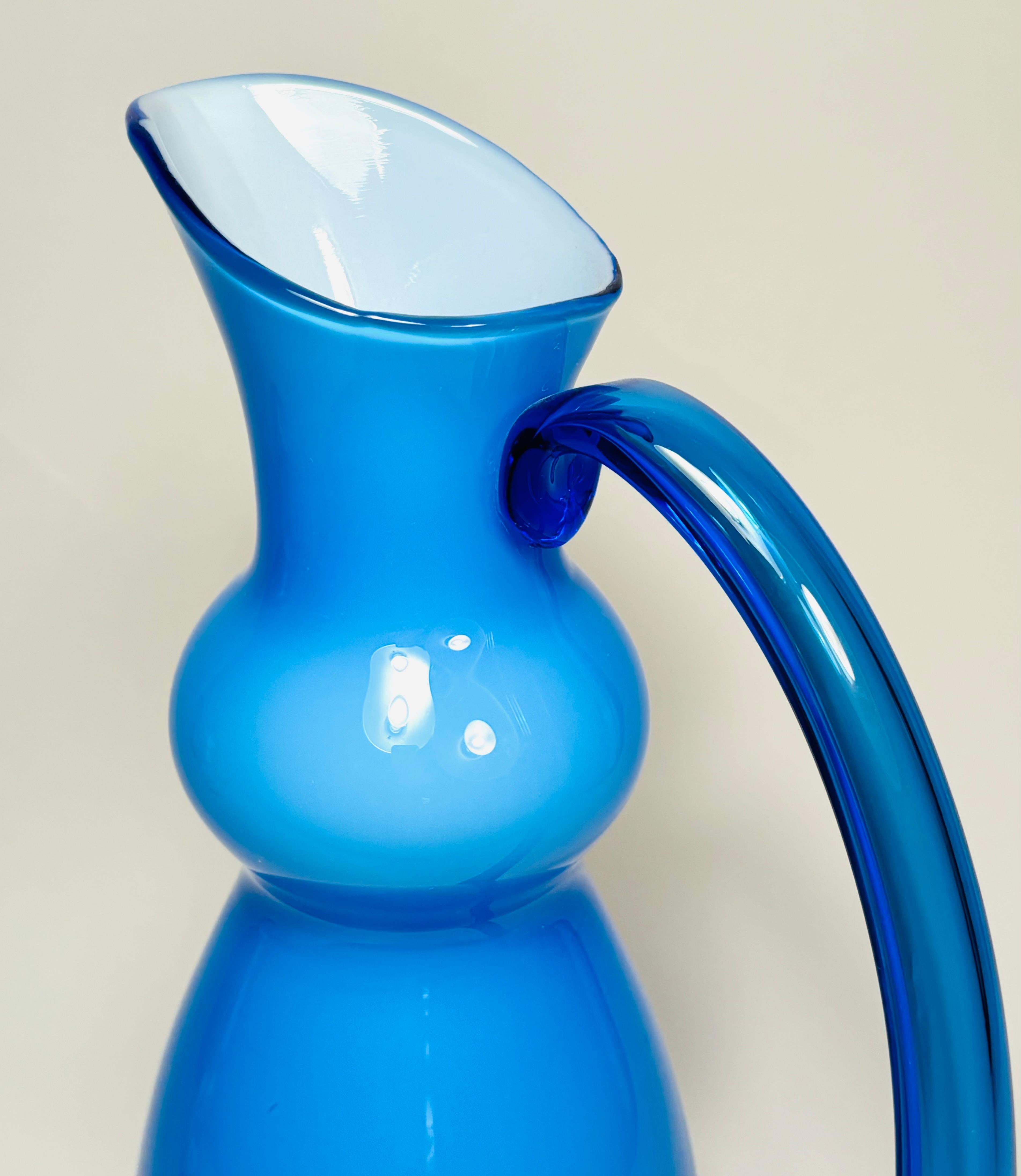 Mid-20th Century Mid Century Modern Signed Blue Cased Glass Pitcher. Orrefors Circa 1960 For Sale