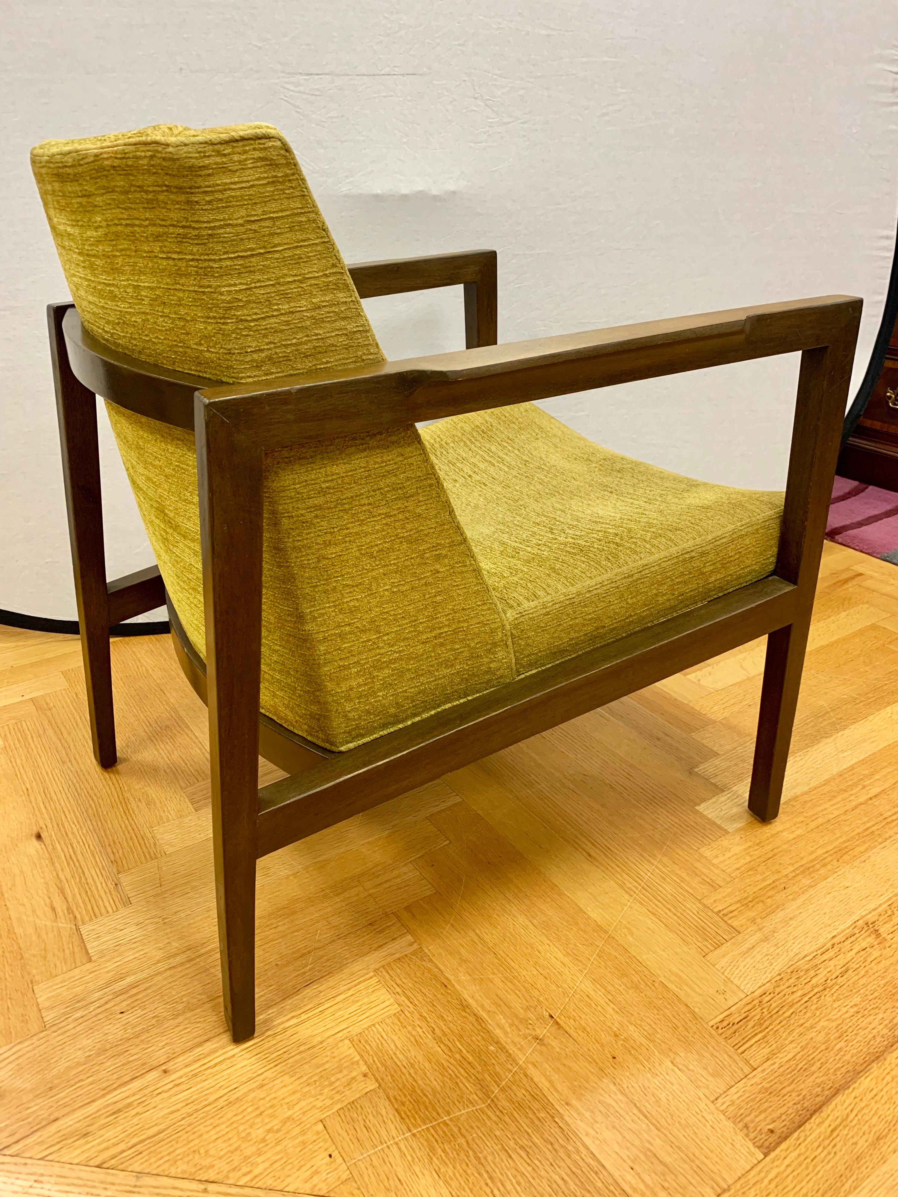 Add a pop of color to your mid century decor with this chartreuse colored arm chair by Edward Wormley for Dunbar. It’s simple and clean lines are a true example of the mid century era. Circa 1950’s with Dunbar hallmarks on bottom.
  