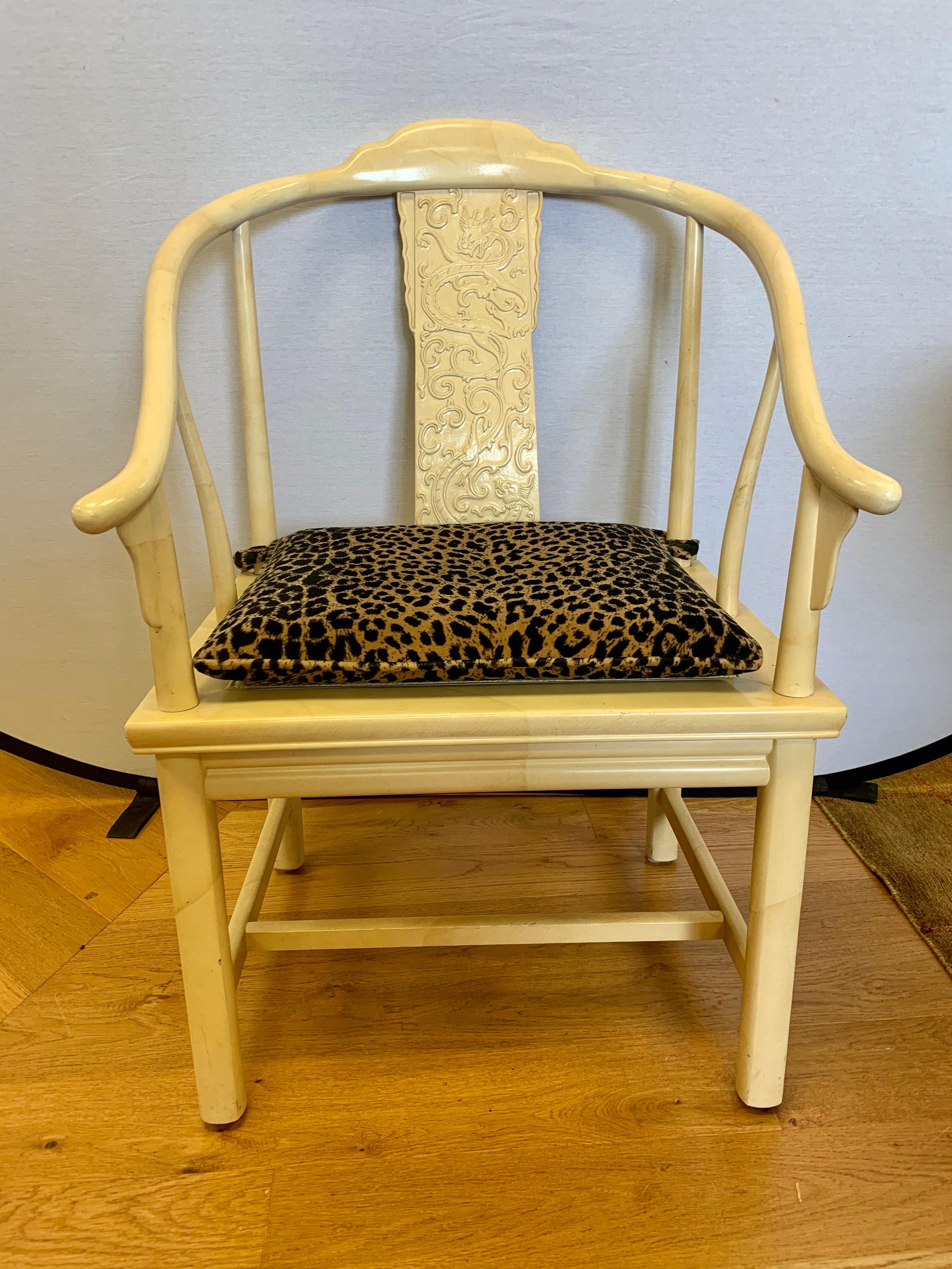 Elegant James Mont style horseshoe chair by Henredon. This one features not only gorgeous cane seat but also a custom leopard set cushion. All manufacturer hallmarks are at bottom. This chair is fully lacquered throughout in a color best described